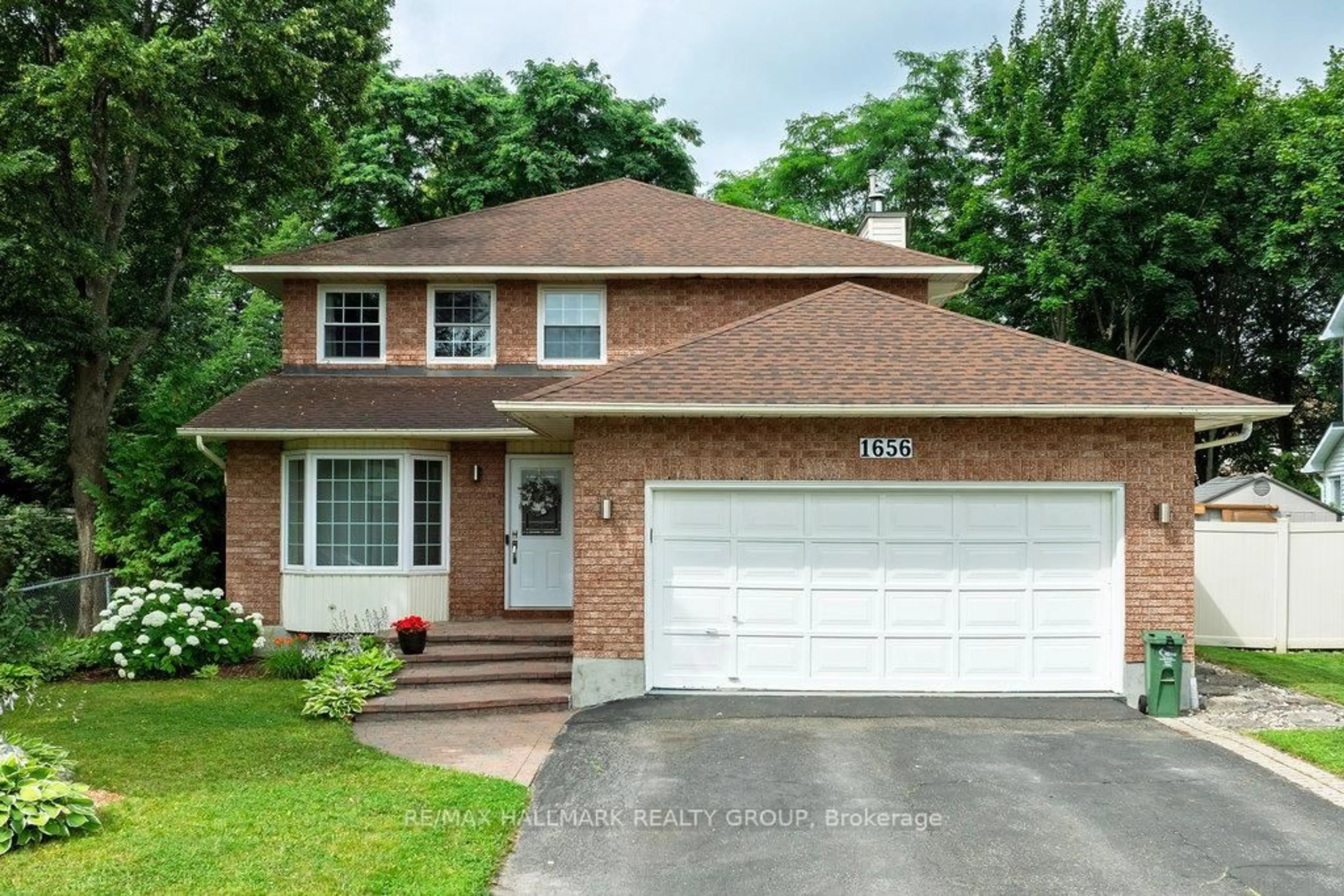 Home with brick exterior material, street for 1656 Canemore Cres, Ottawa Ontario K4A 1S6