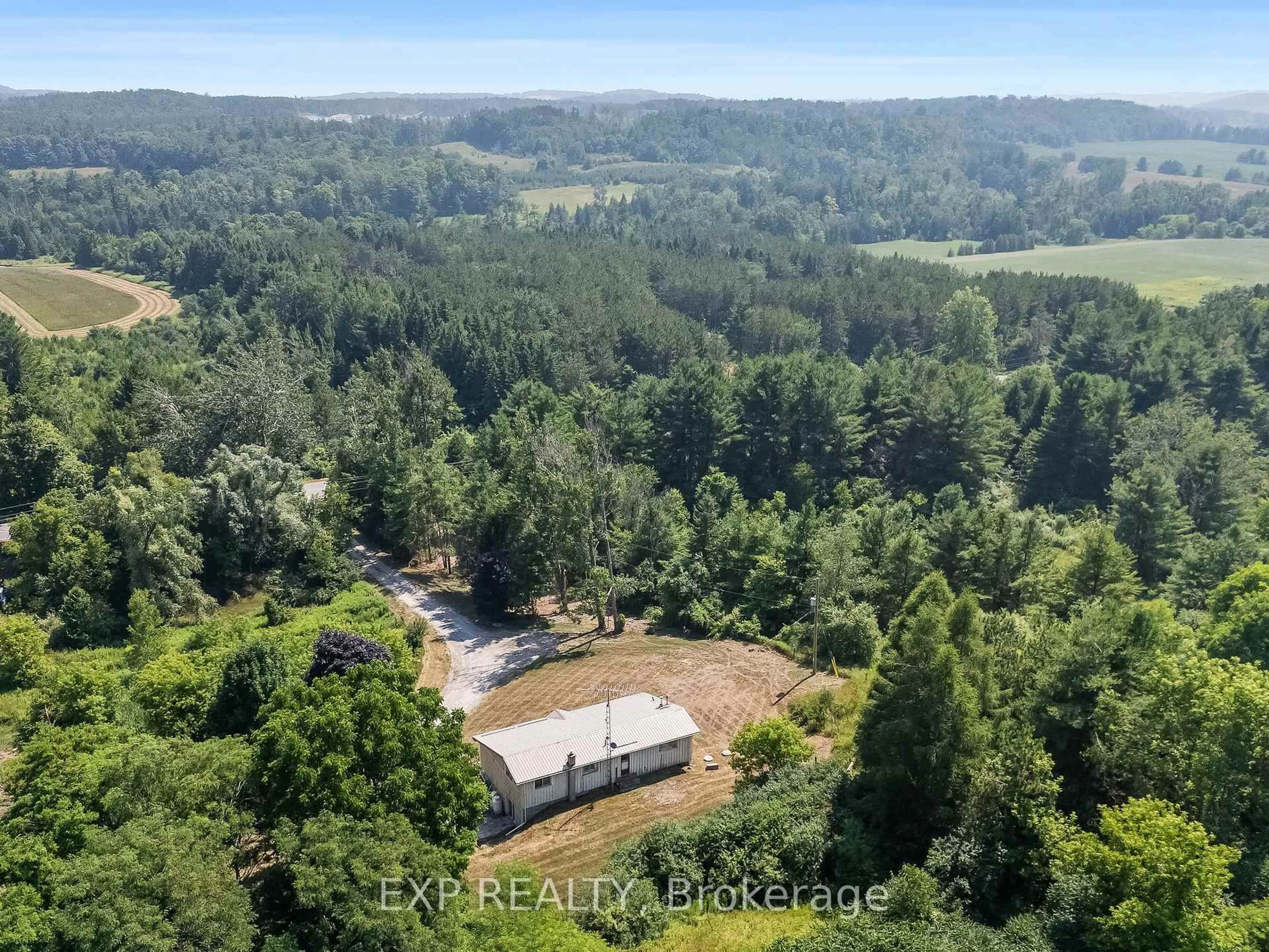 A pic from outside/outdoor area/front of a property/back of a property/a pic from drone, forest/trees view for 3326 Shelter Valley Rd, Alnwick/Haldimand Ontario K0K 2G0