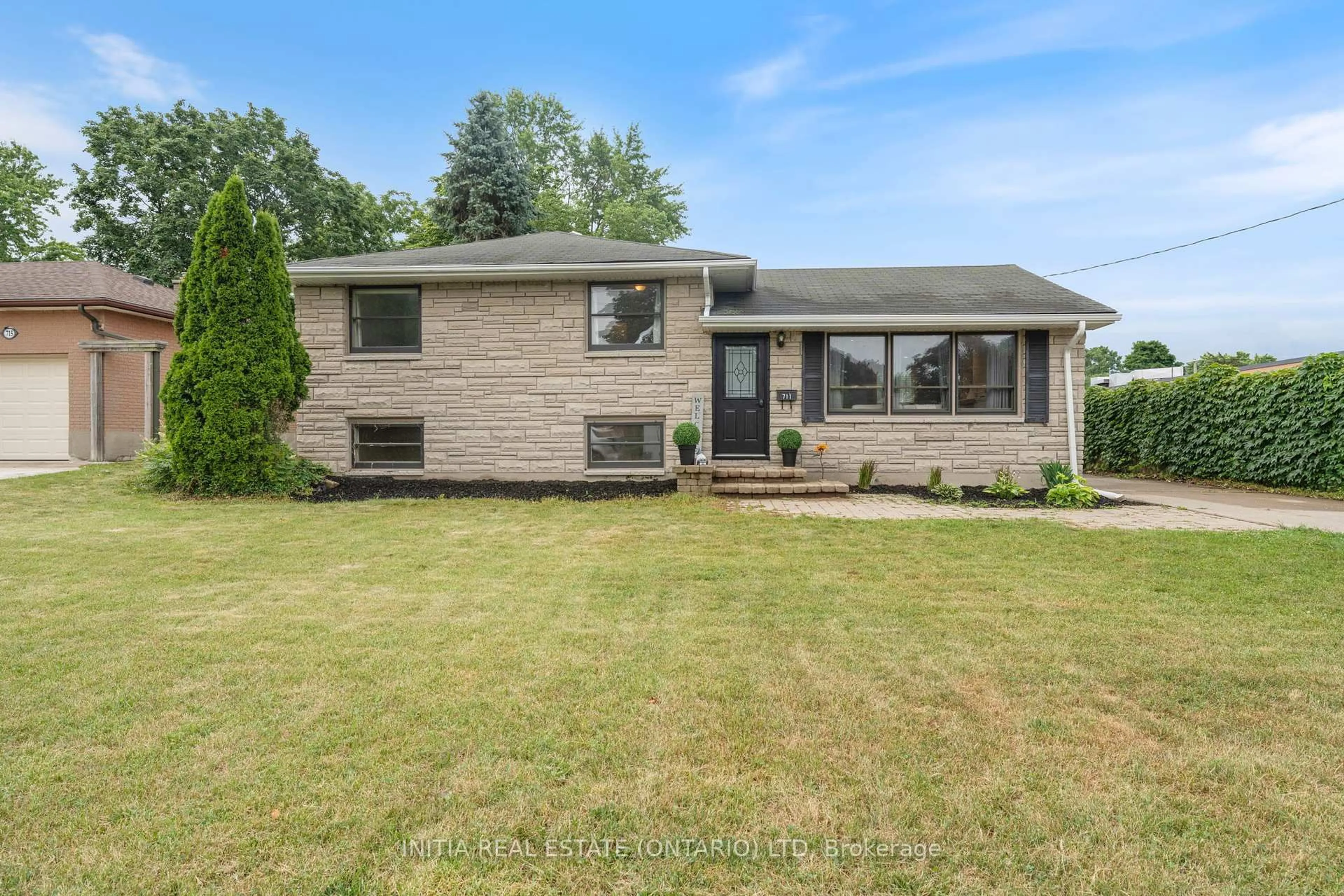 Home with brick exterior material, street for 711 Cathcart Blvd, Sarnia Ontario N7V 2N6