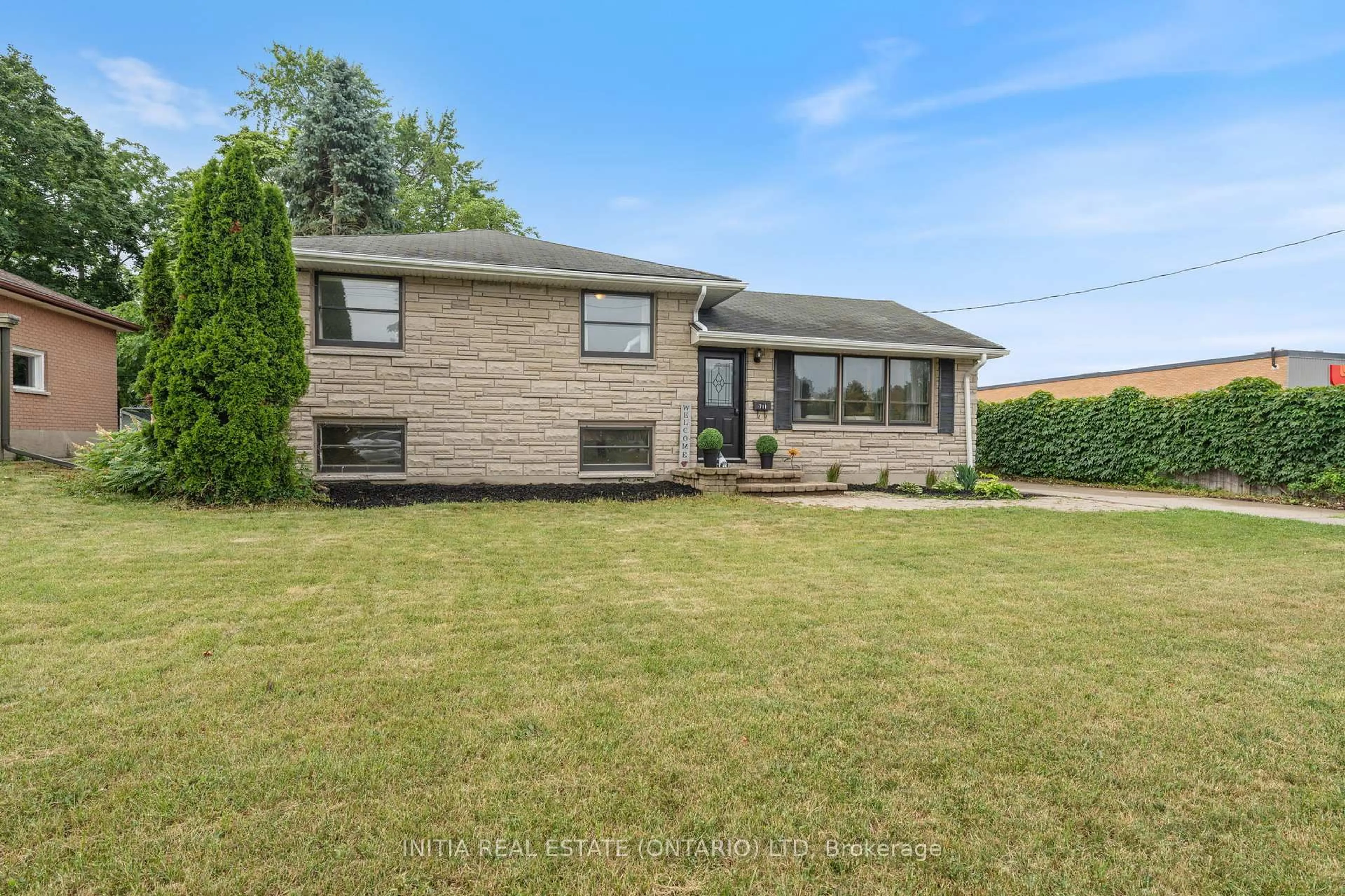 Home with brick exterior material, street for 711 Cathcart Blvd, Sarnia Ontario N7V 2N6