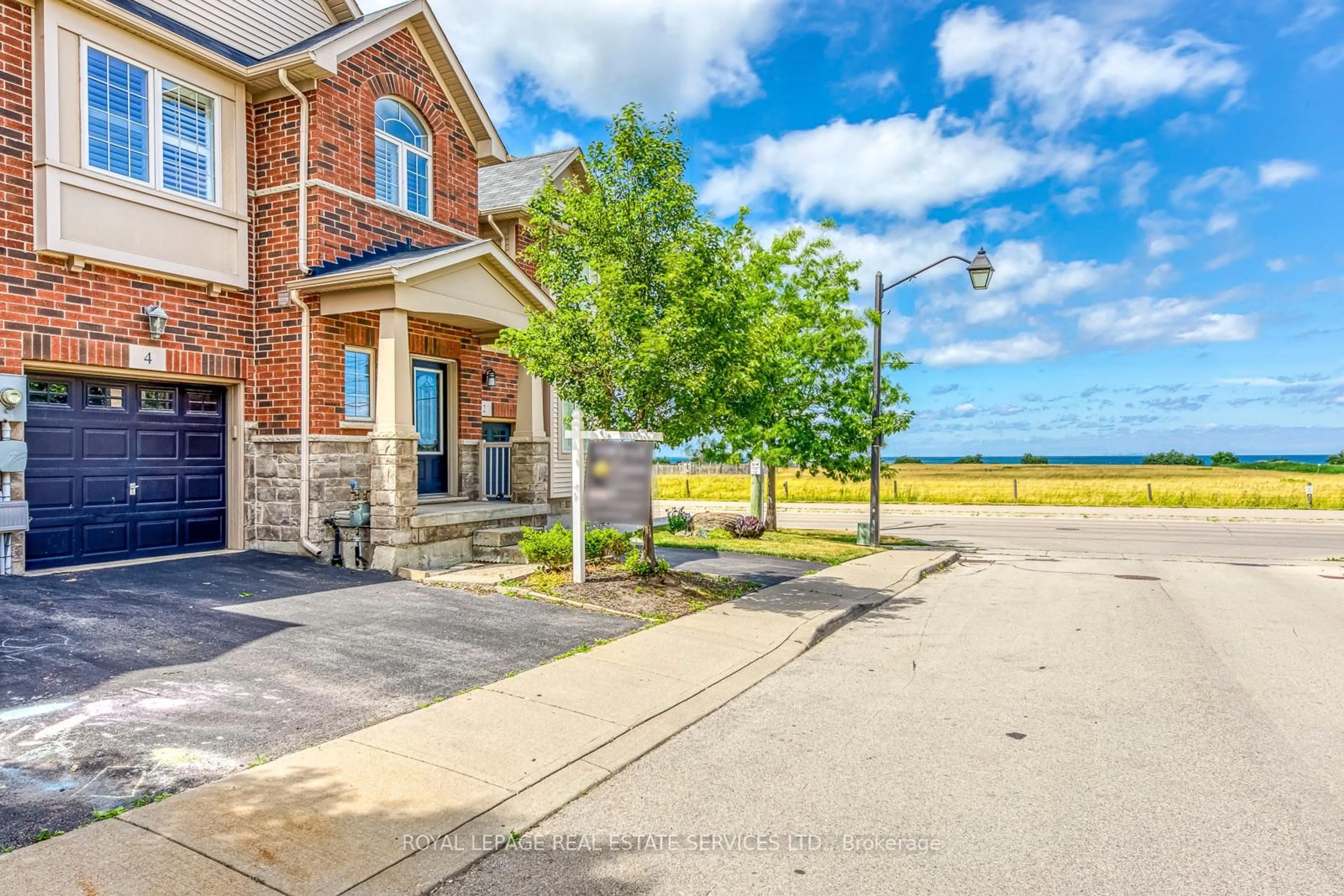 Home with brick exterior material, water/lake/river/ocean view for 541 Winston Rd #4, Grimsby Ontario L3M 0C5