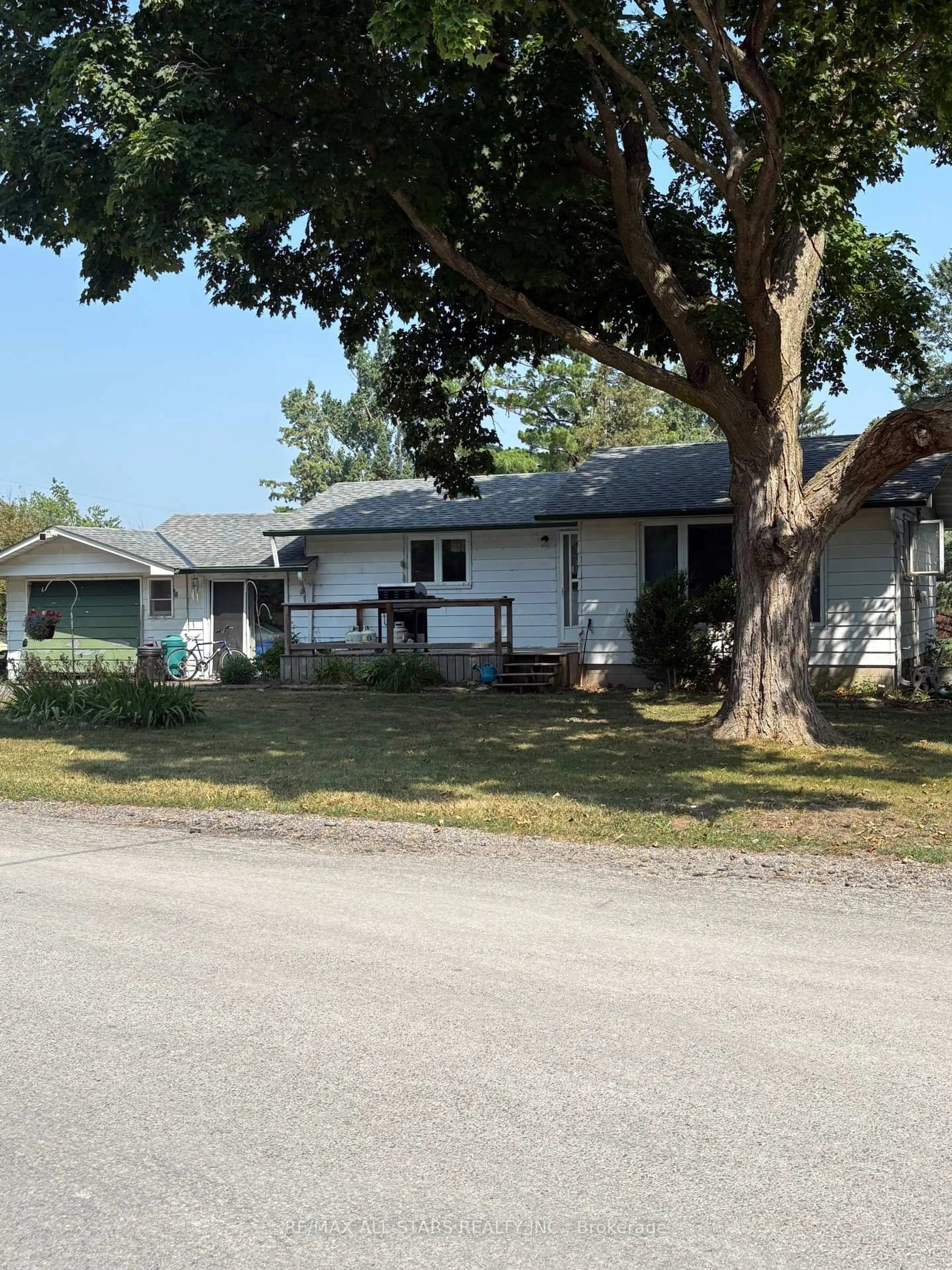 Home with vinyl exterior material, street for 309 Kenrei Rd, Kawartha Lakes Ontario K9V 4R1