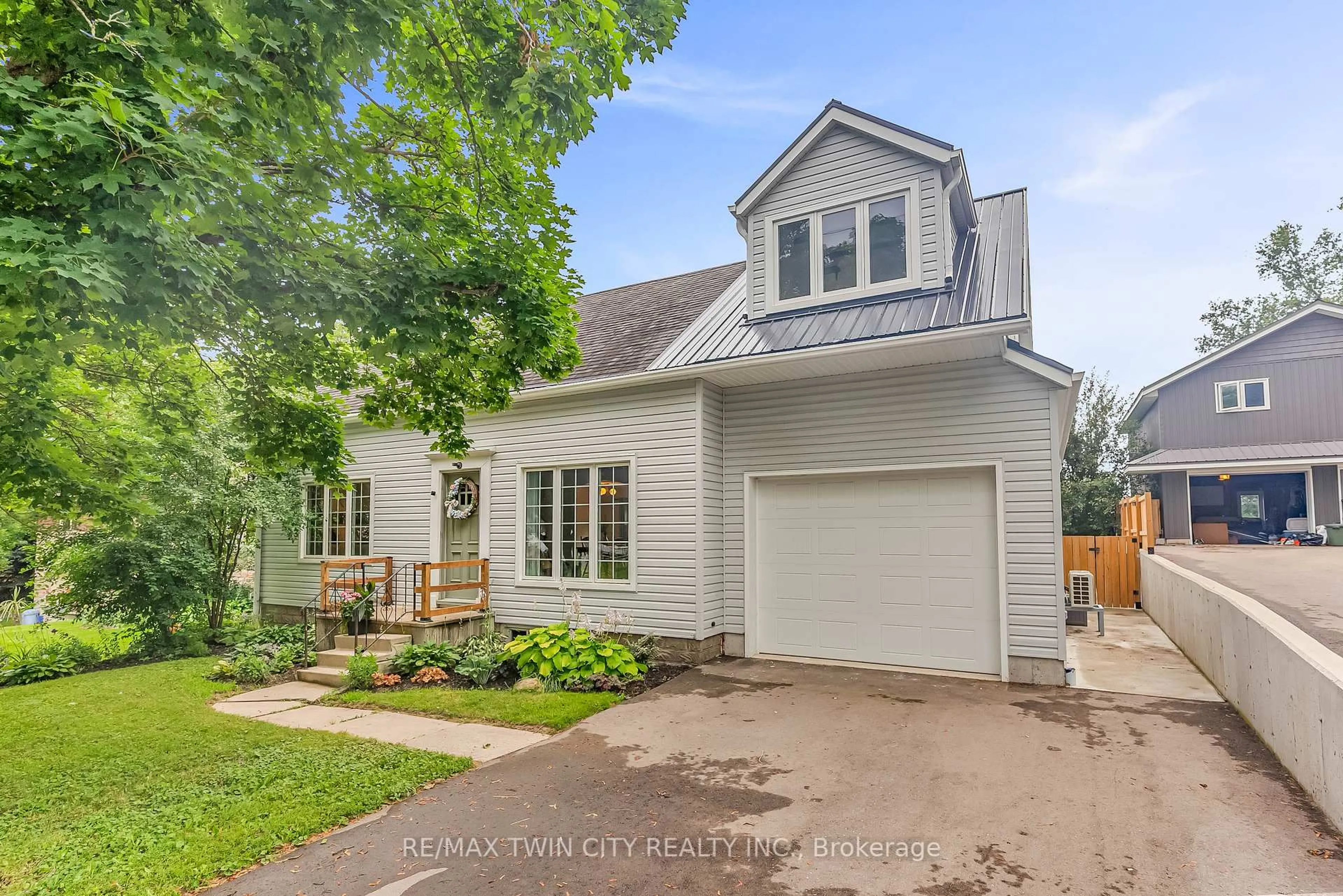 Home with vinyl exterior material, street for 3464 LOBSINGER Line, Wellesley Ontario N0B 2M0