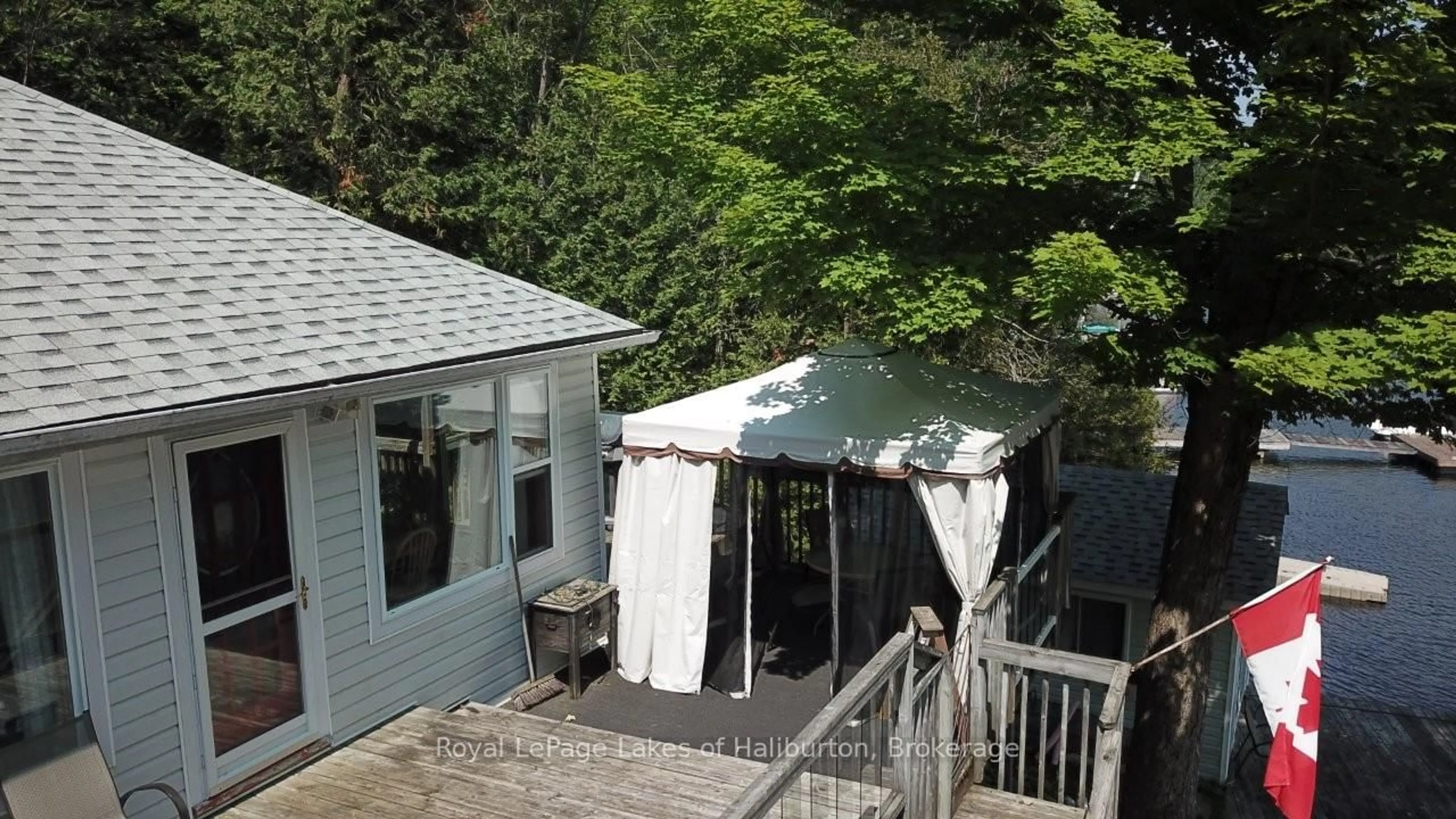 A pic from outside/outdoor area/front of a property/back of a property/a pic from drone, unknown for 39 FR 393 (Lakeside Dr) Dr, Trent Lakes Ontario K0M 2A0