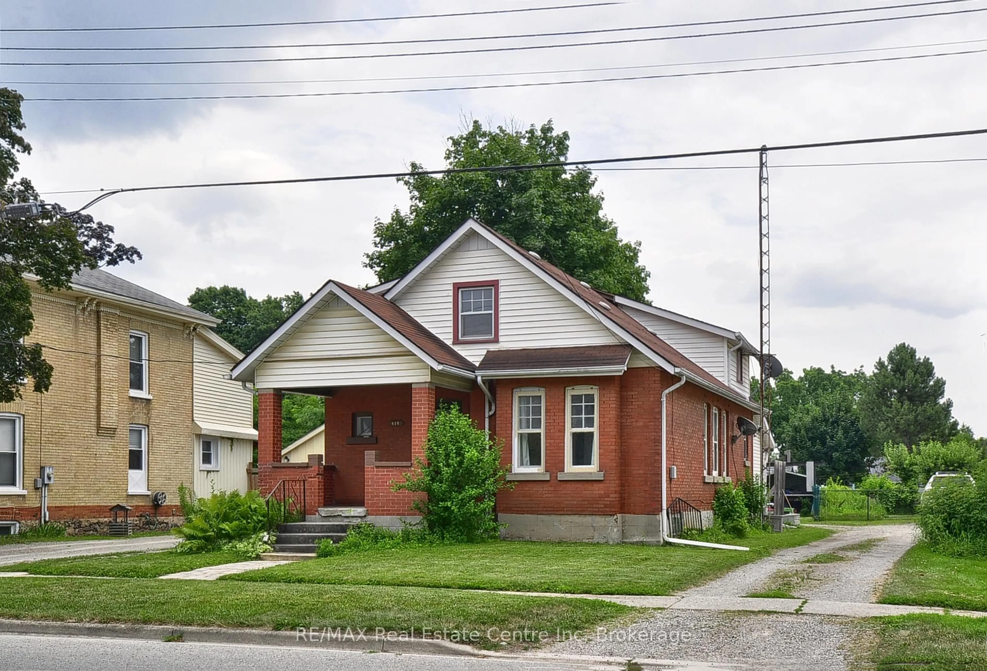 Home with brick exterior material, street for 141 KING St, Brant Ontario N0E 1A0