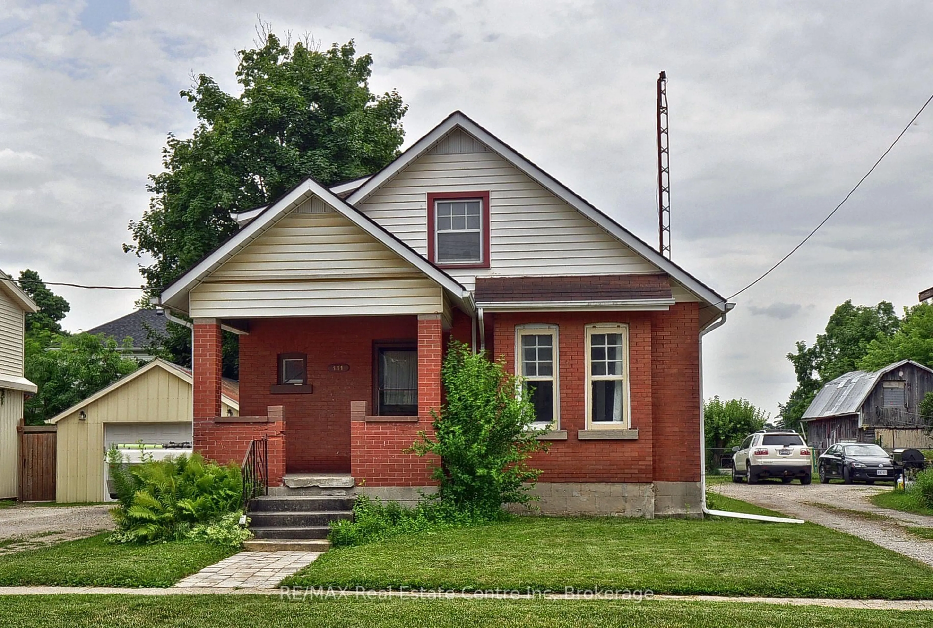 Home with brick exterior material, street for 141 KING St, Brant Ontario N0E 1A0