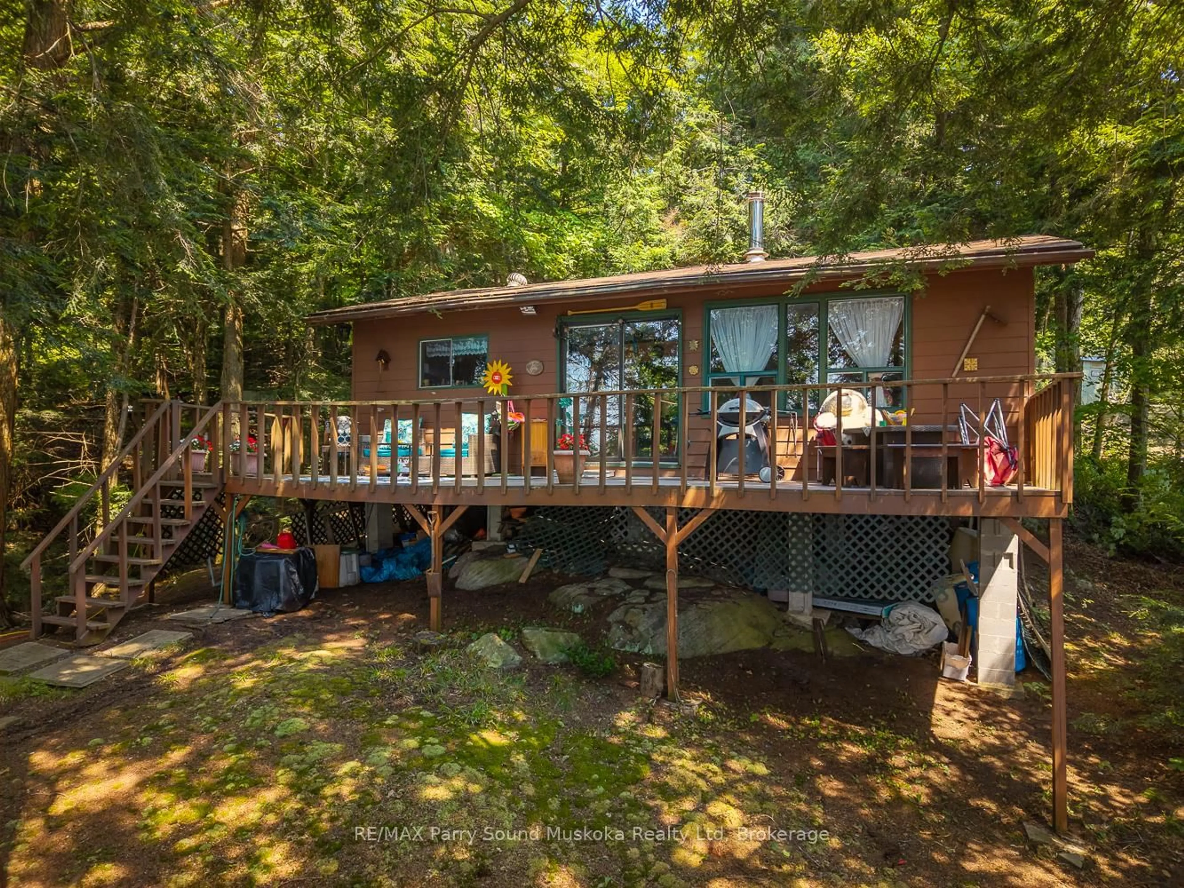A pic from outside/outdoor area/front of a property/back of a property/a pic from drone, water/lake/river/ocean view for 20 Peninsula Tr, Seguin Ontario P2A 2W8