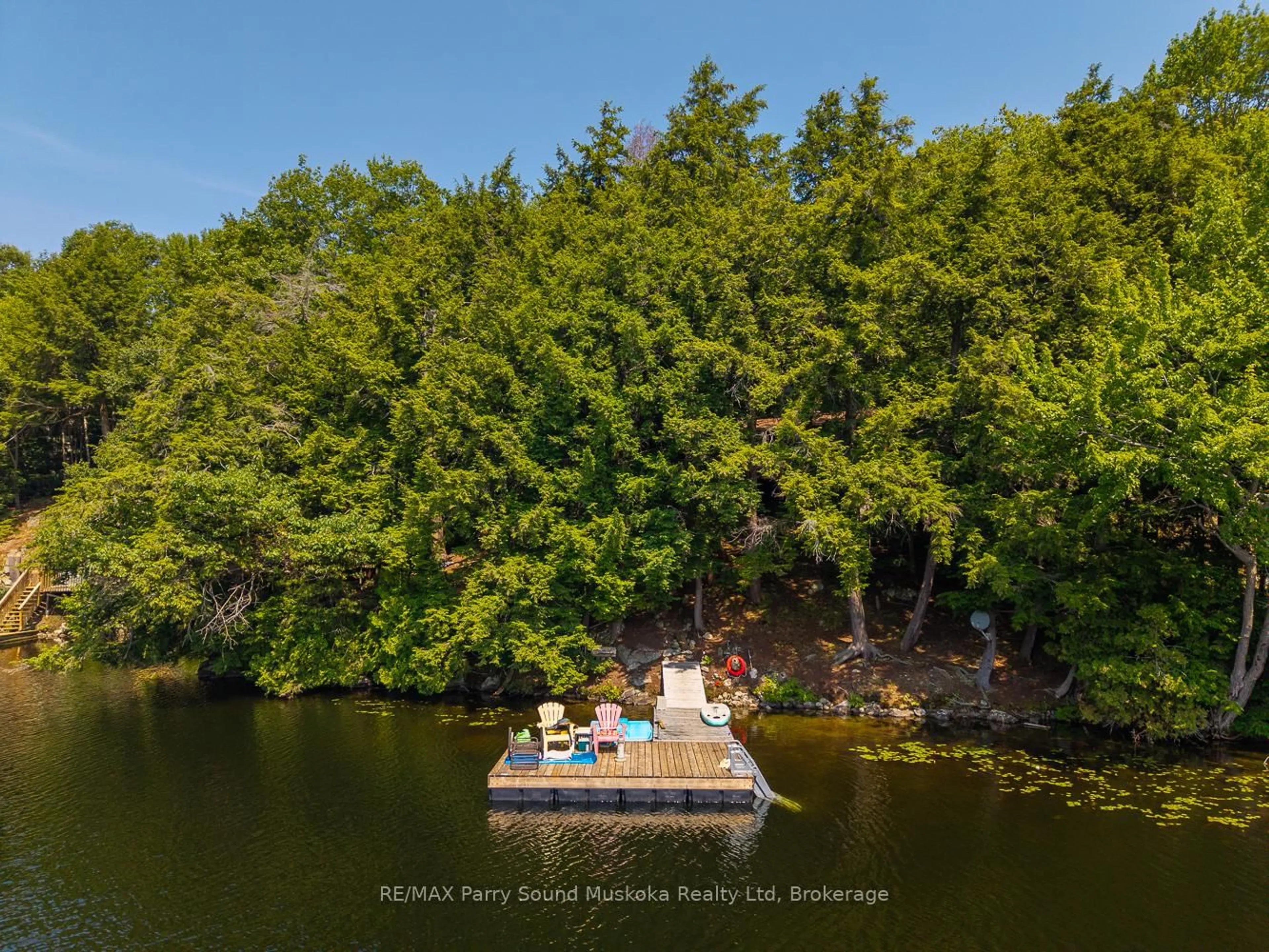 A pic from outside/outdoor area/front of a property/back of a property/a pic from drone, water/lake/river/ocean view for 20 Peninsula Tr, Seguin Ontario P2A 2W8