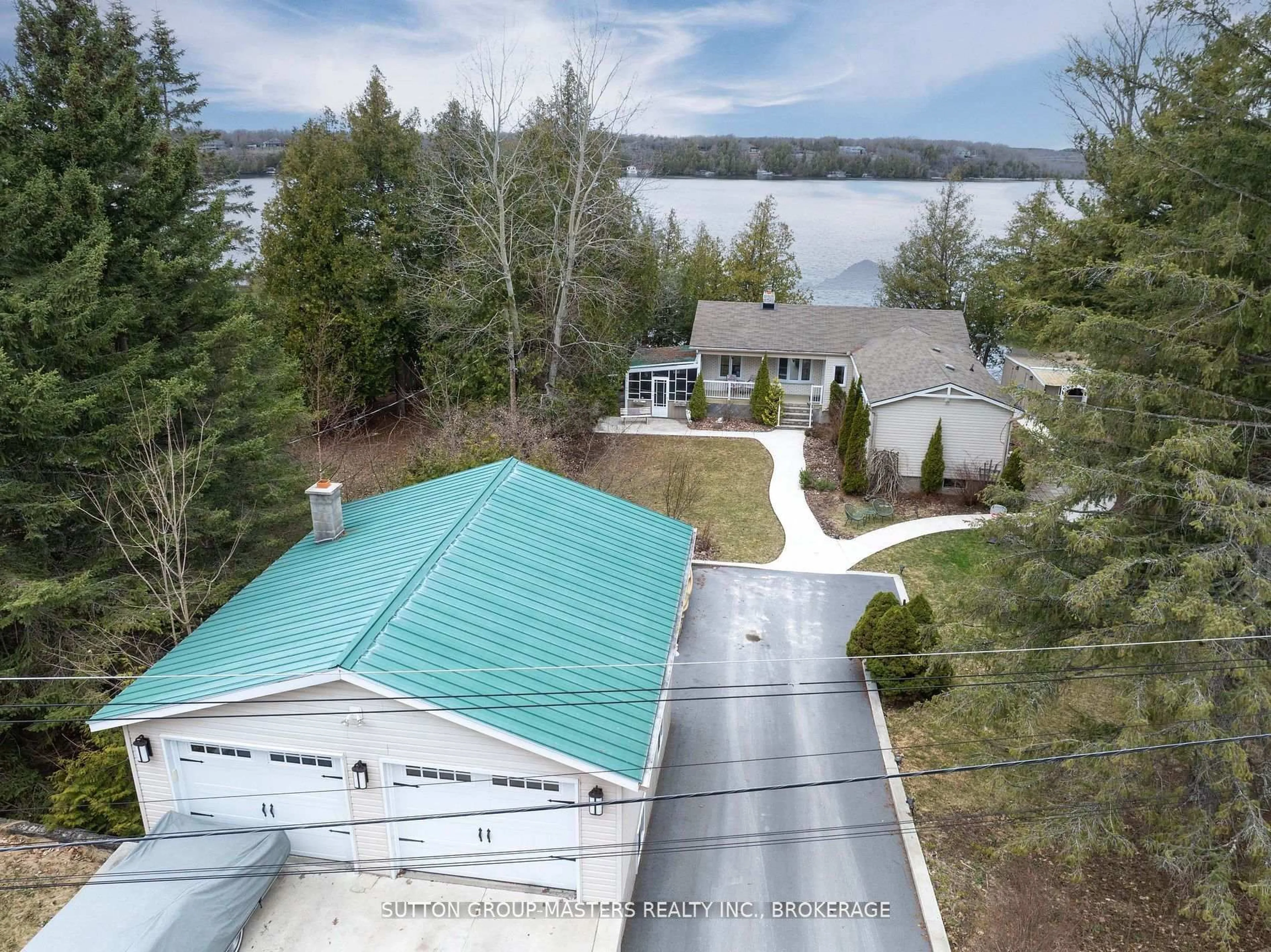 A pic from outside/outdoor area/front of a property/back of a property/a pic from drone, water/lake/river/ocean view for 4496 Red Maple Lane, Inverary Ontario K0H 1X0