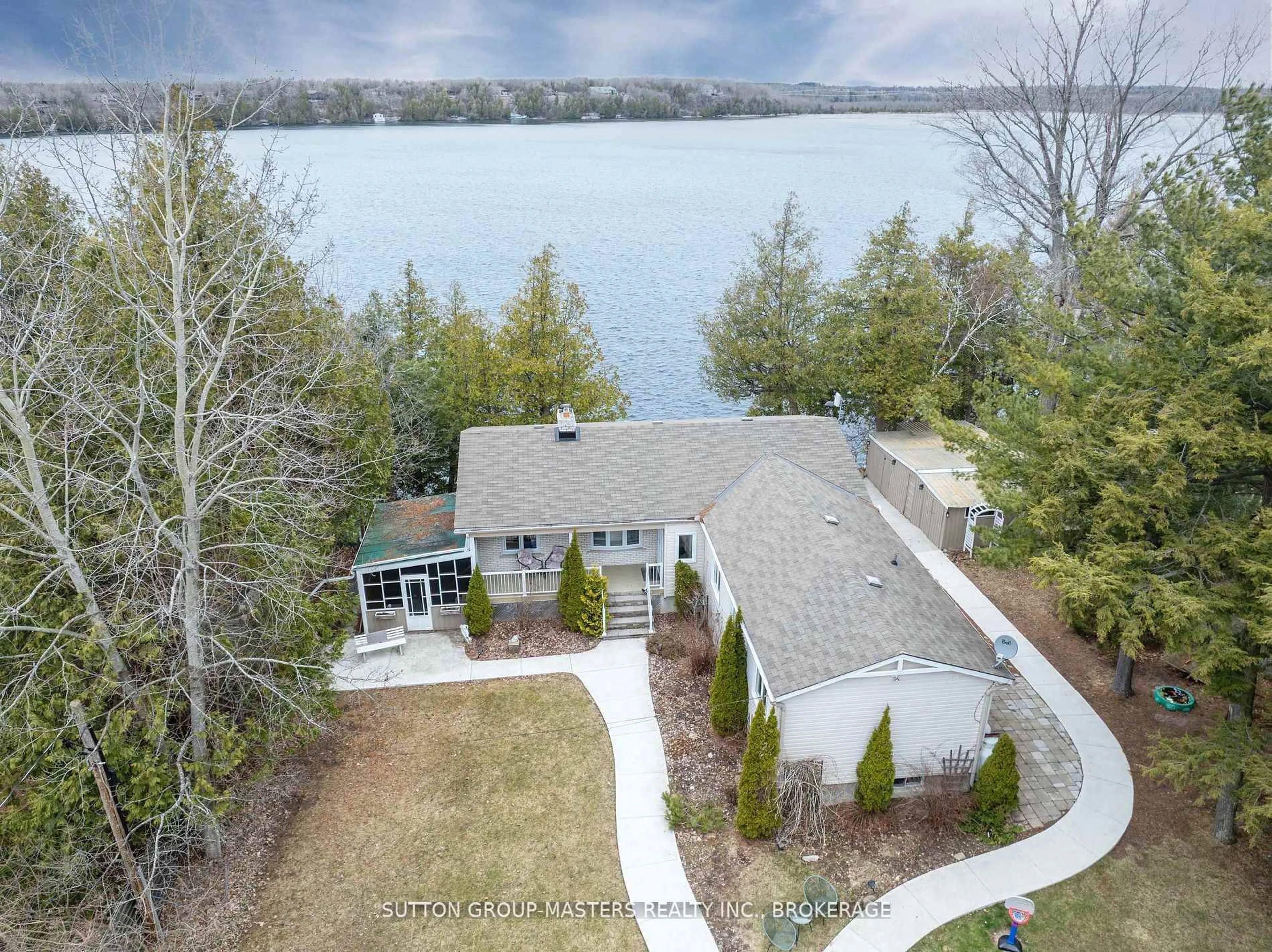 A pic from outside/outdoor area/front of a property/back of a property/a pic from drone, water/lake/river/ocean view for 4496 Red Maple Lane, Inverary Ontario K0H 1X0