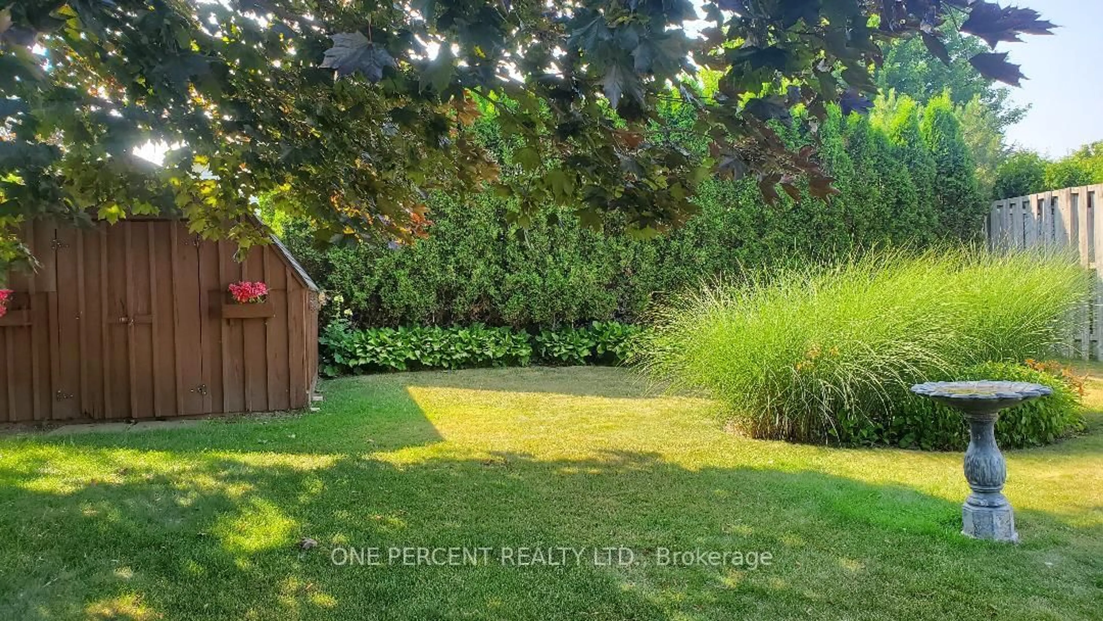 A pic from outside/outdoor area/front of a property/back of a property/a pic from drone, forest/trees view for 18 Magwood Crt, Stratford Ontario N4Z 1G3