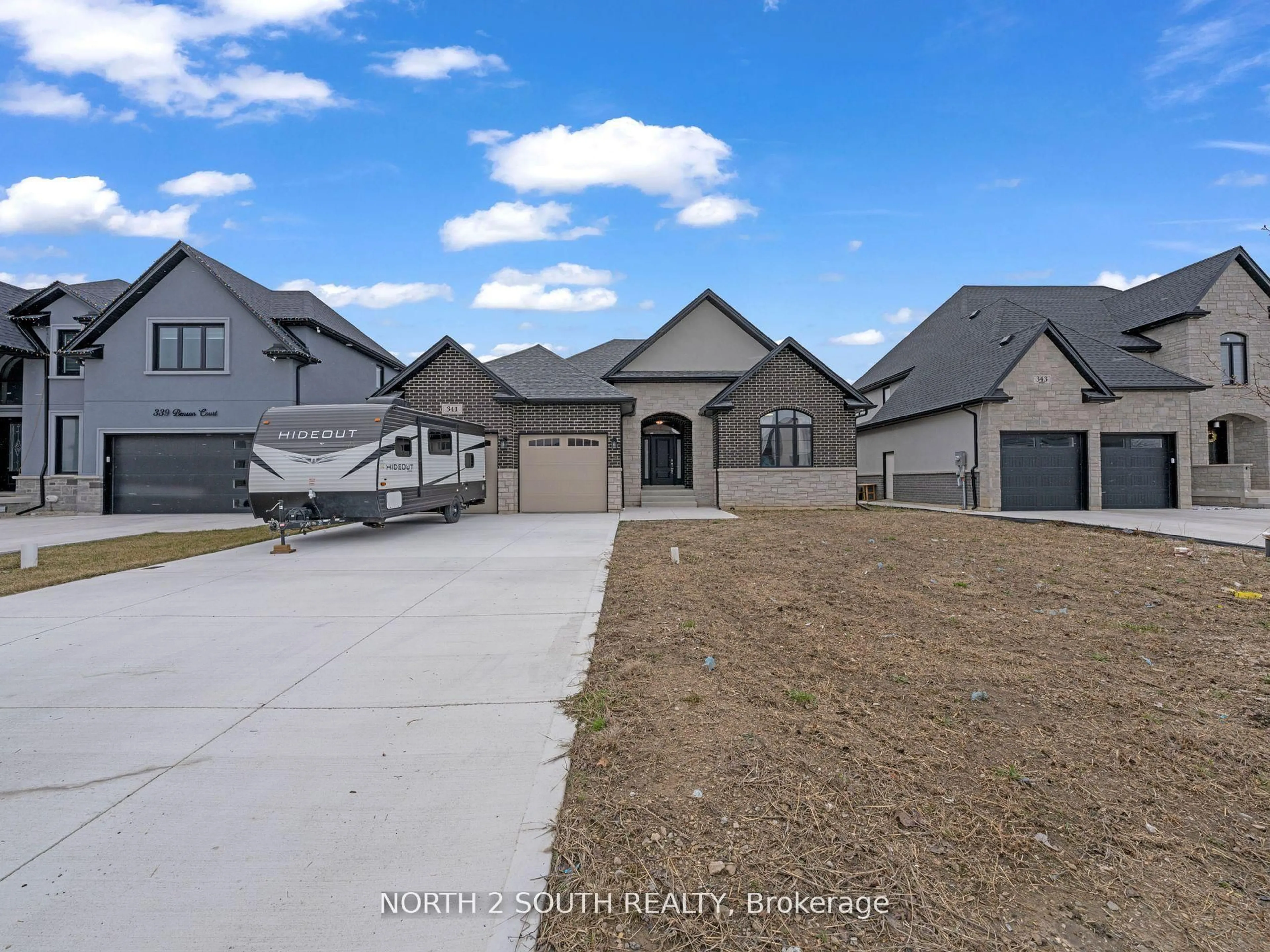 A pic from outside/outdoor area/front of a property/back of a property/a pic from drone, street for 341 Benson Crt, Amherstburg Ontario N9V 0G7