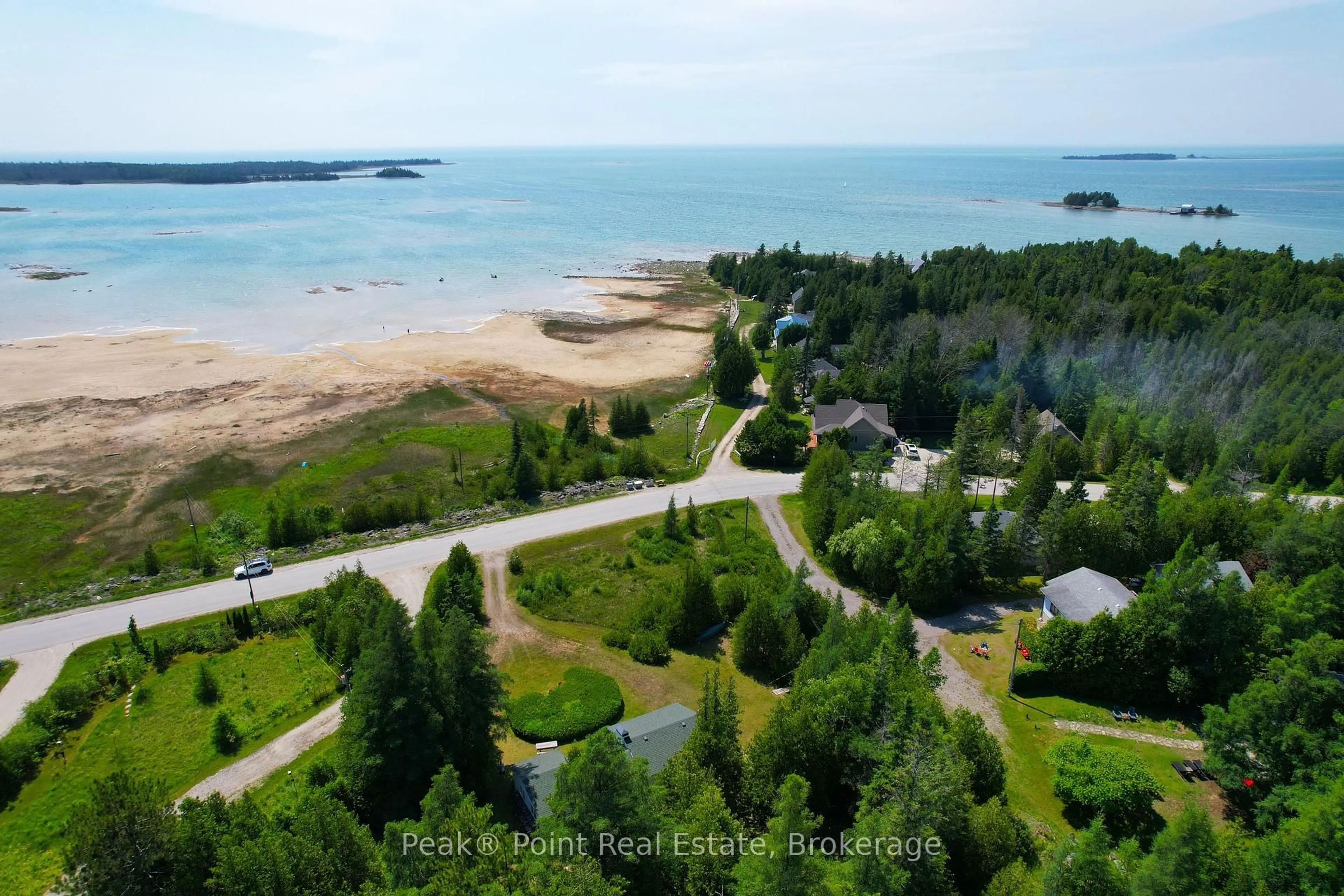 A pic from outside/outdoor area/front of a property/back of a property/a pic from drone, water/lake/river/ocean view for 503 Bay St, South Bruce Peninsula Ontario N0H 2T0