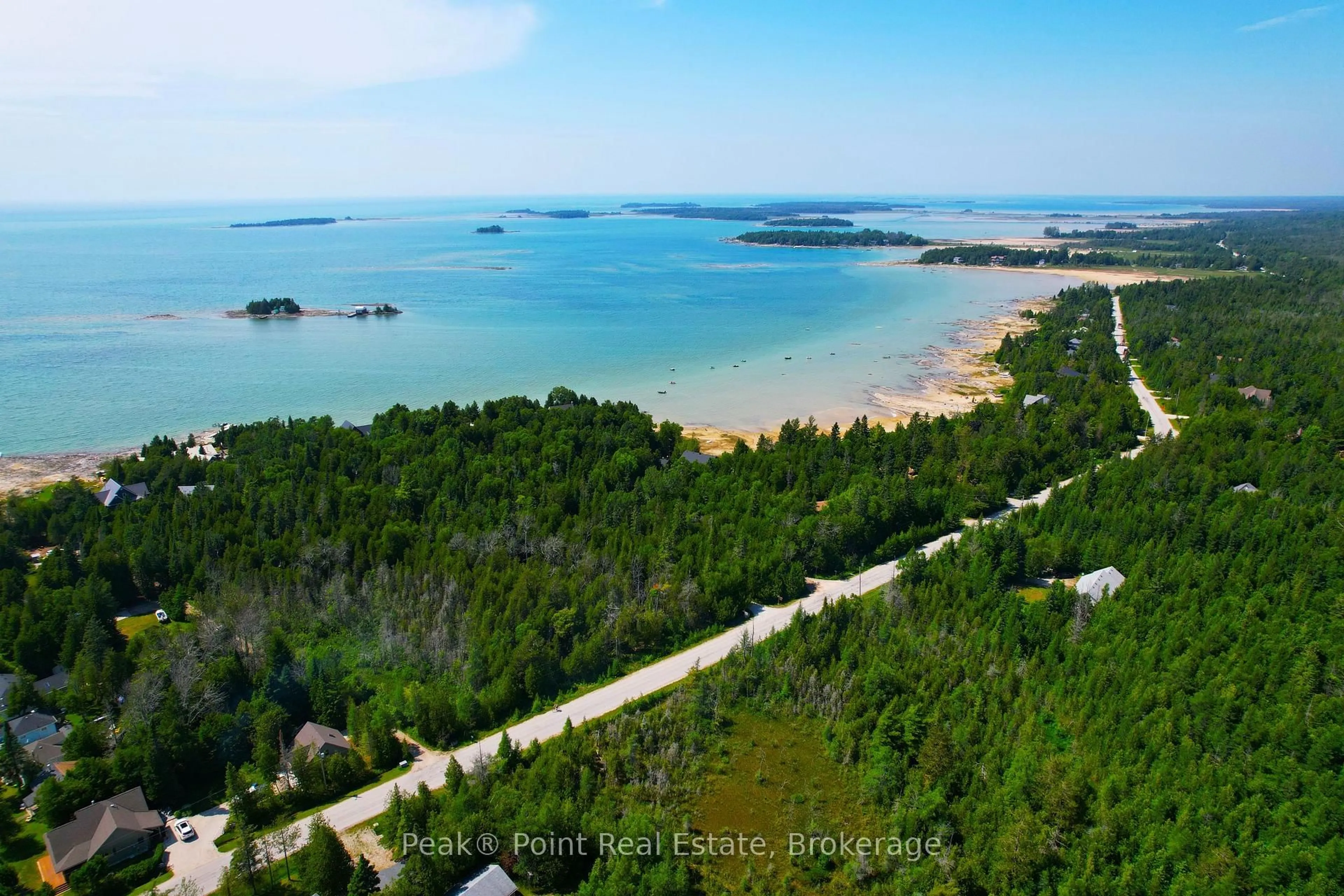 A pic from outside/outdoor area/front of a property/back of a property/a pic from drone, water/lake/river/ocean view for 503 Bay St, South Bruce Peninsula Ontario N0H 2T0