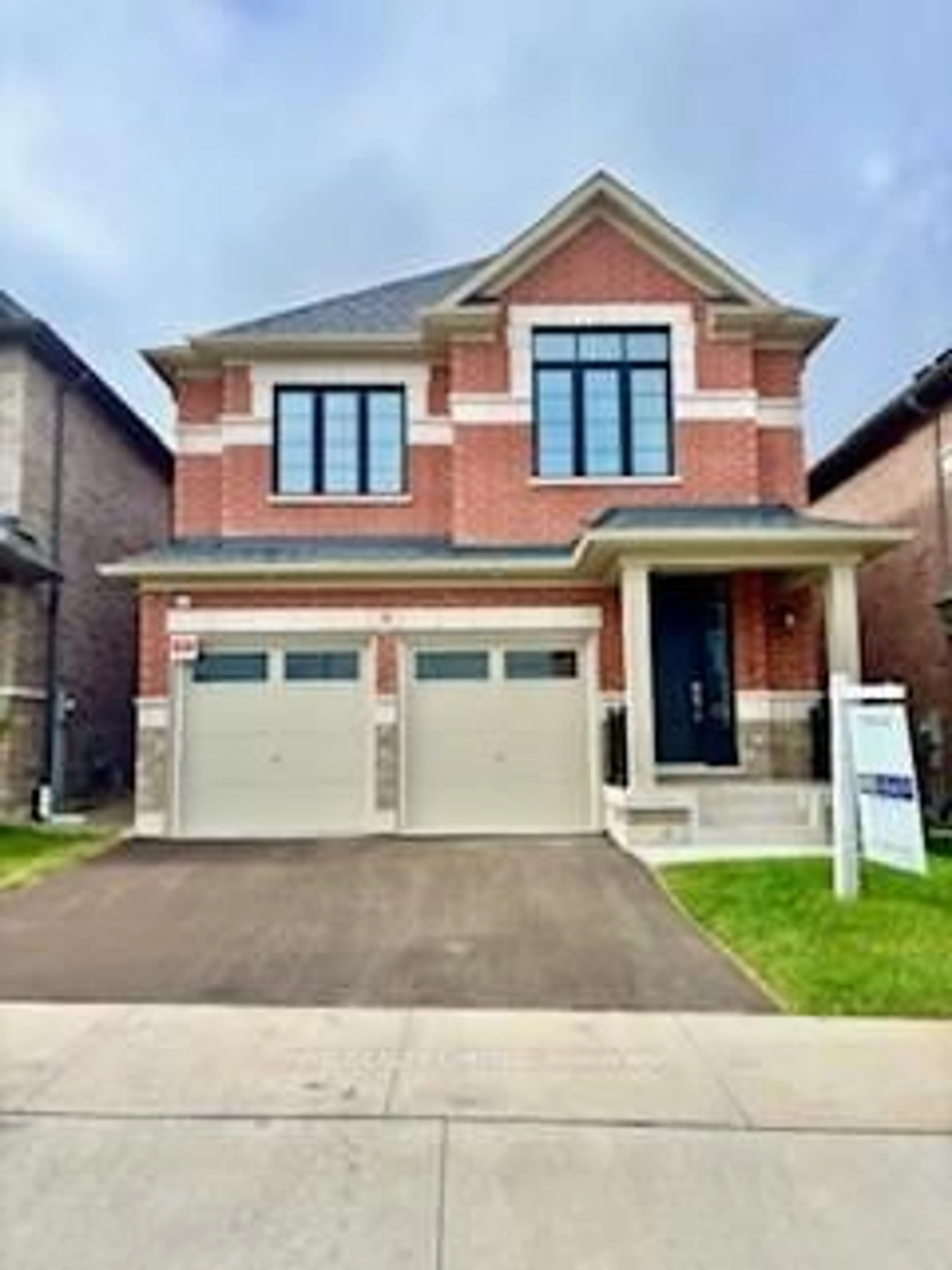 Home with brick exterior material, street for 39 Guernsey Dr, Kitchener Ontario N2R 0T7