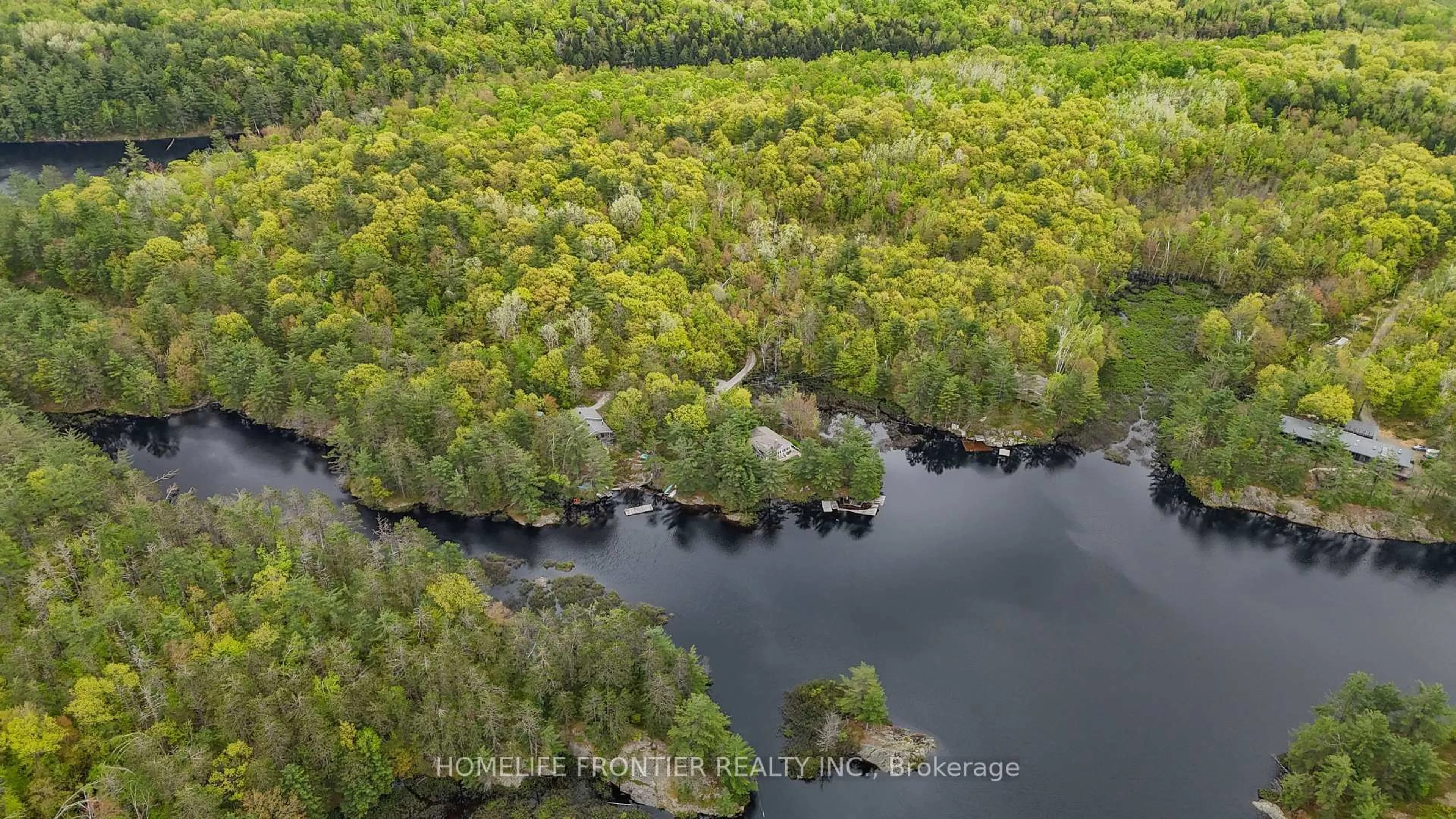 A pic from outside/outdoor area/front of a property/back of a property/a pic from drone, water/lake/river/ocean view for 1019 Silk Lane, Minden Hills Ontario K0M 2K0