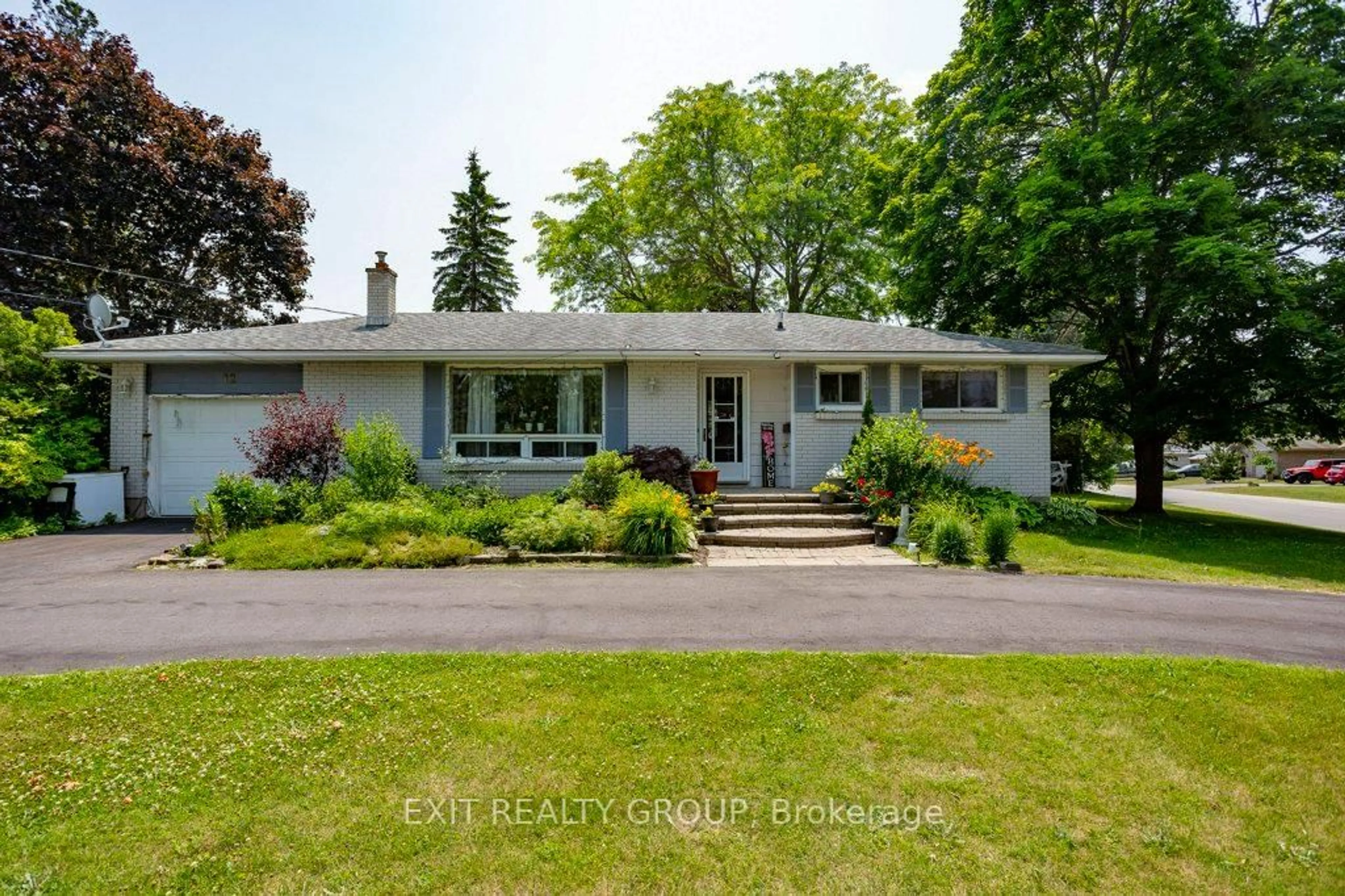 Home with vinyl exterior material, street for 12 Nelson St, Quinte West Ontario K0K 1E0
