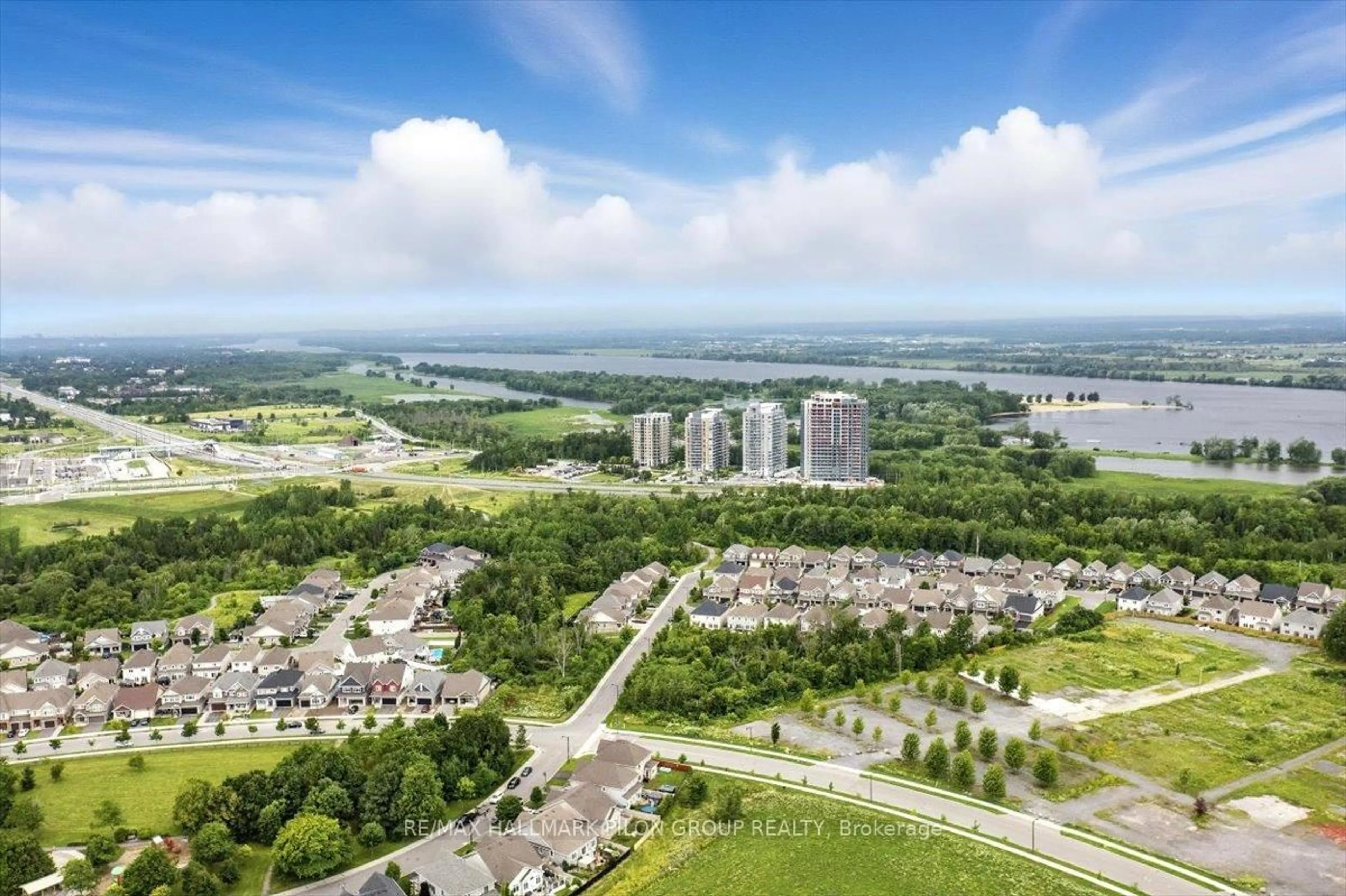 A pic from outside/outdoor area/front of a property/back of a property/a pic from drone, water/lake/river/ocean view for 943 Geographe Terr, Orleans Ontario K4A 1J7
