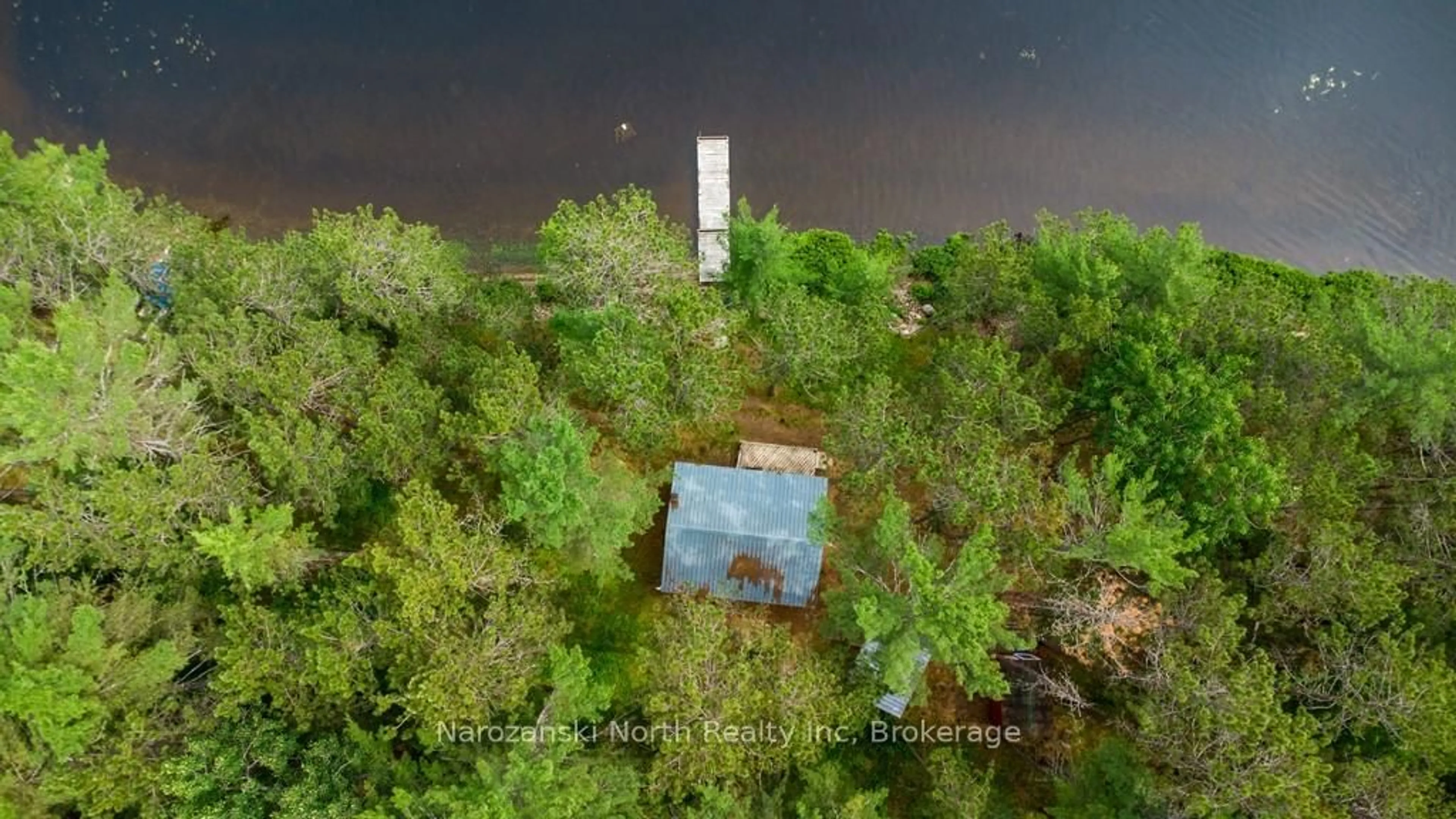 A pic from outside/outdoor area/front of a property/back of a property/a pic from drone, water/lake/river/ocean view for 56 Eighteen Mile Island, French River Ontario P0M 1A0