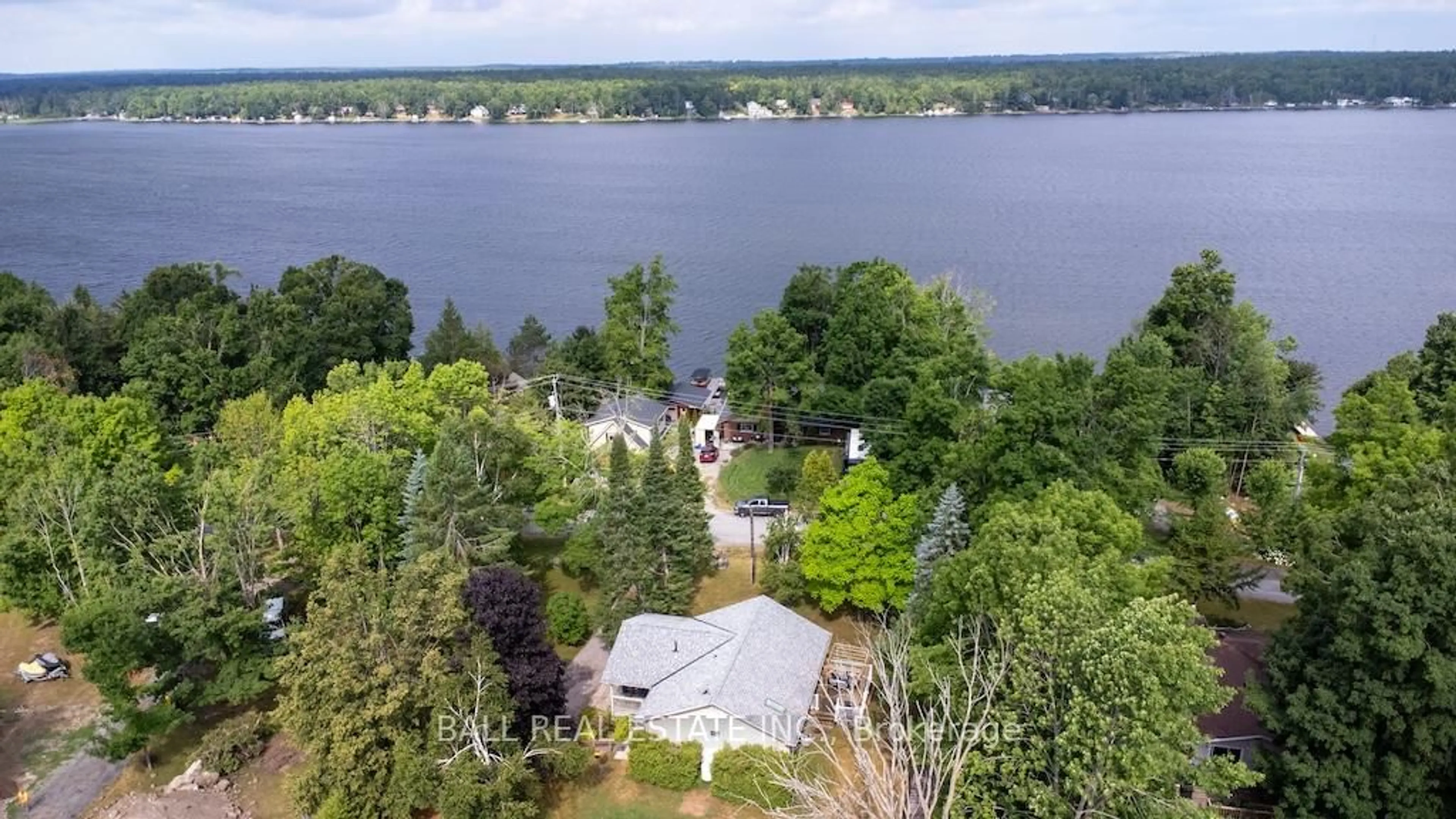 A pic from outside/outdoor area/front of a property/back of a property/a pic from drone, water/lake/river/ocean view for 2811 Antelope Tr, Selwyn Ontario K0L 2H0