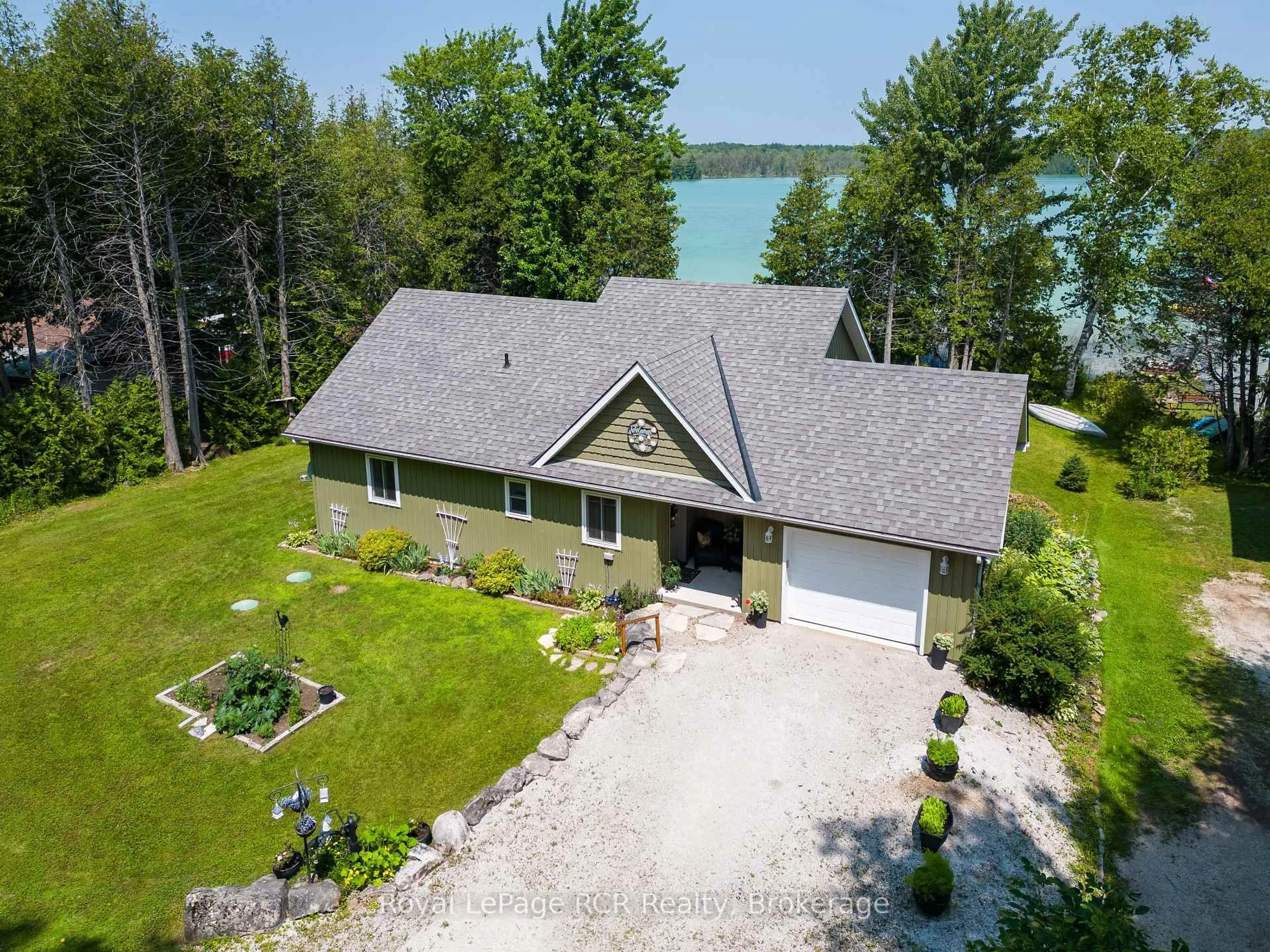 A pic from outside/outdoor area/front of a property/back of a property/a pic from drone, water/lake/river/ocean view for 121 Browns Lane, Georgian Bluffs Ontario N0H 2K0