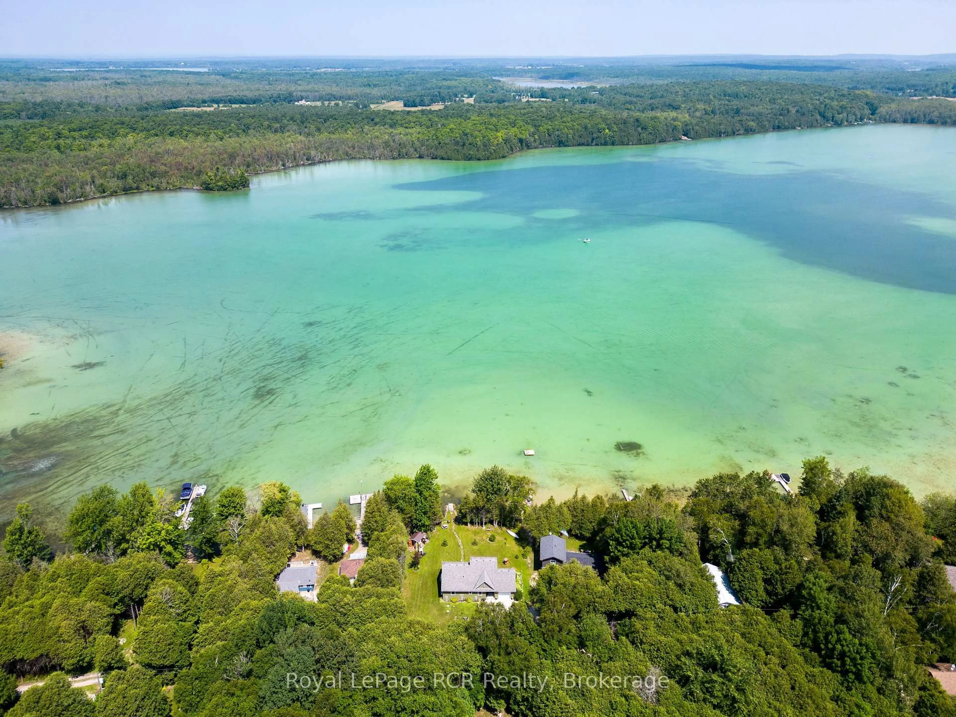 A pic from outside/outdoor area/front of a property/back of a property/a pic from drone, water/lake/river/ocean view for 121 Browns Lane, Georgian Bluffs Ontario N0H 2K0