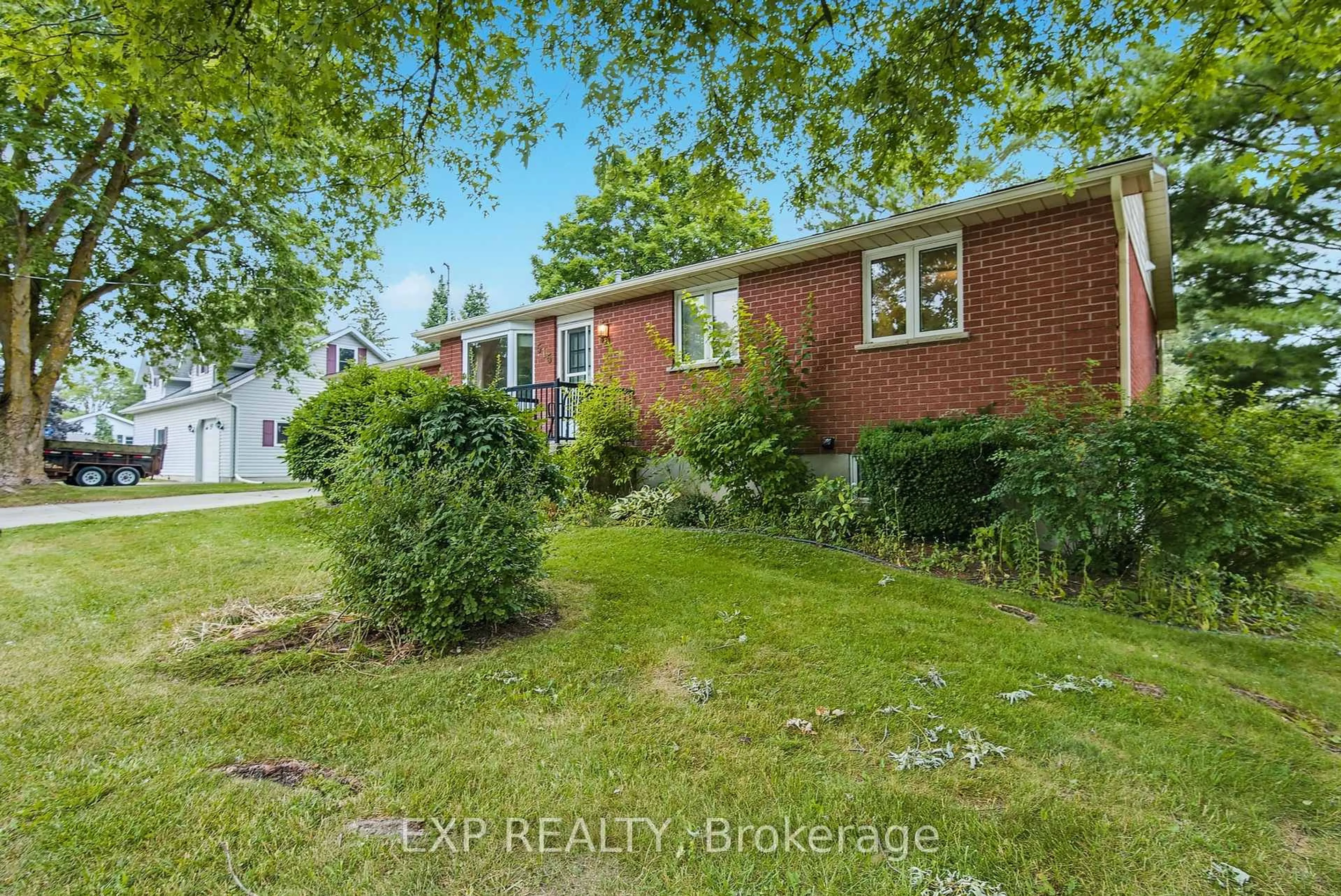 A pic from outside/outdoor area/front of a property/back of a property/a pic from drone, street for 515 Elm Ave, North Perth Ontario N4W 3G3