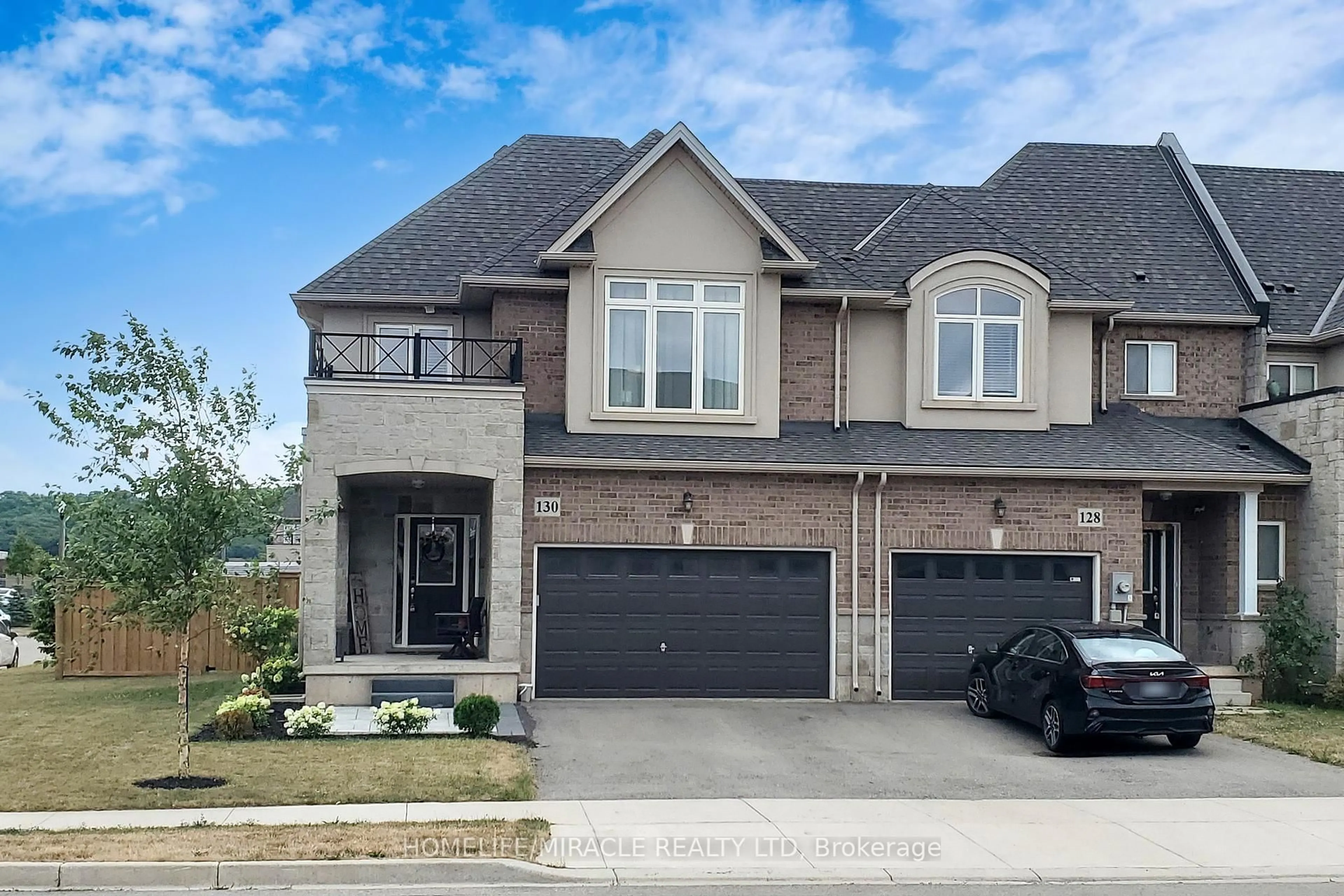 Home with brick exterior material, street for 130 Sonoma Lane, Hamilton Ontario L8E 0J9