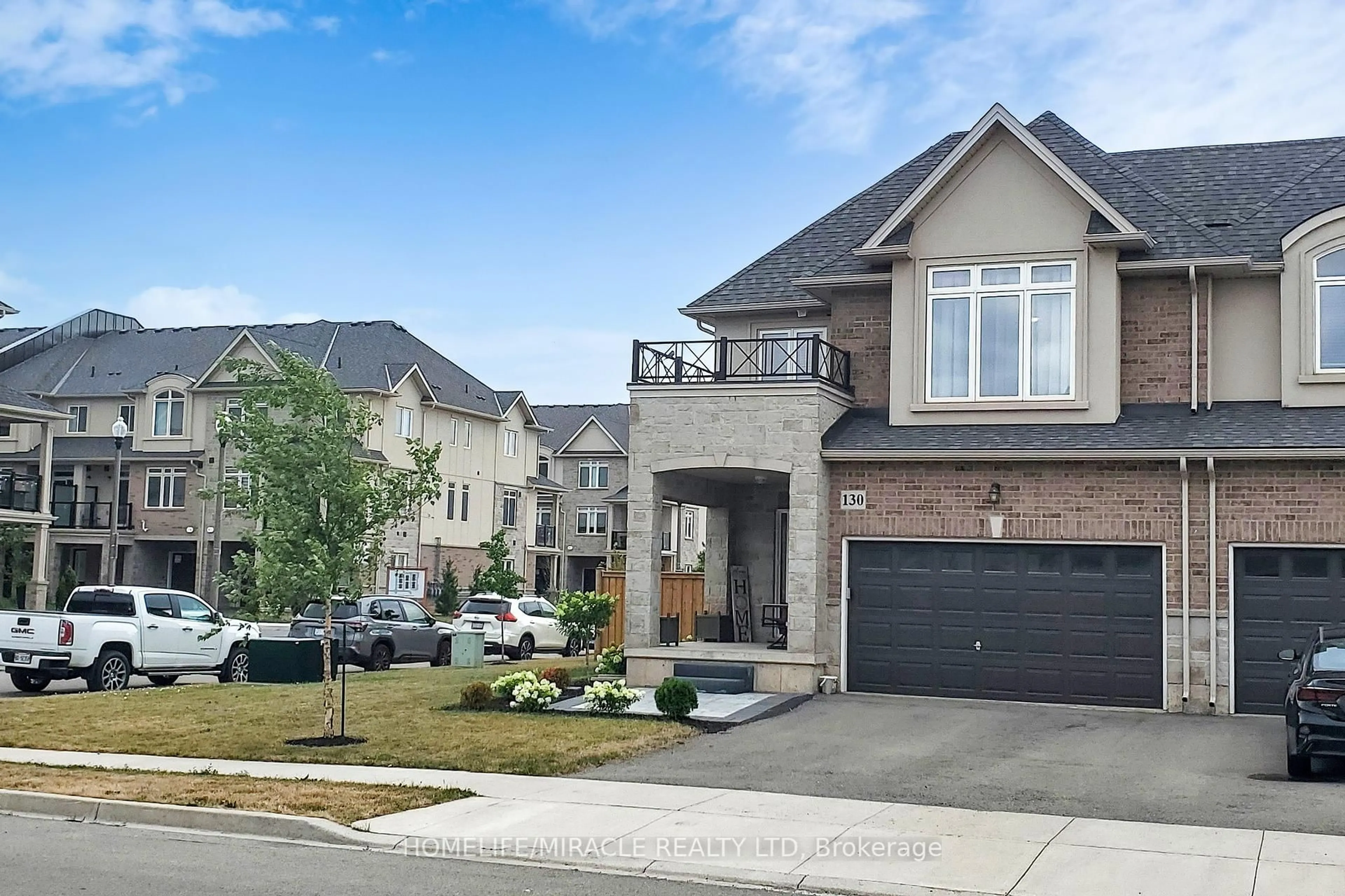 Home with brick exterior material, street for 130 Sonoma Lane, Hamilton Ontario L8E 0J9
