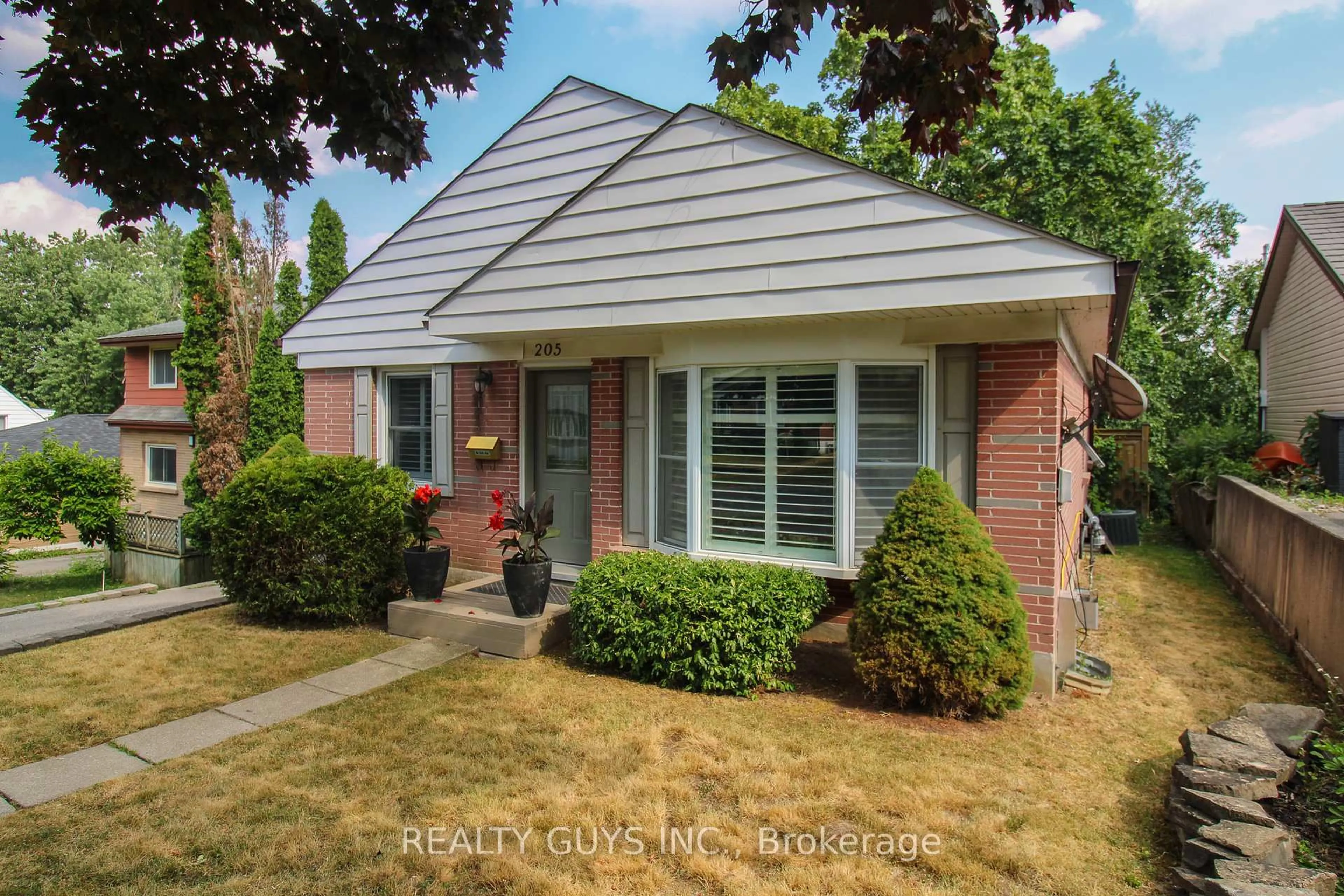 Home with brick exterior material, street for 205 Shelbourne St, Peterborough North Ontario K9H 5K3
