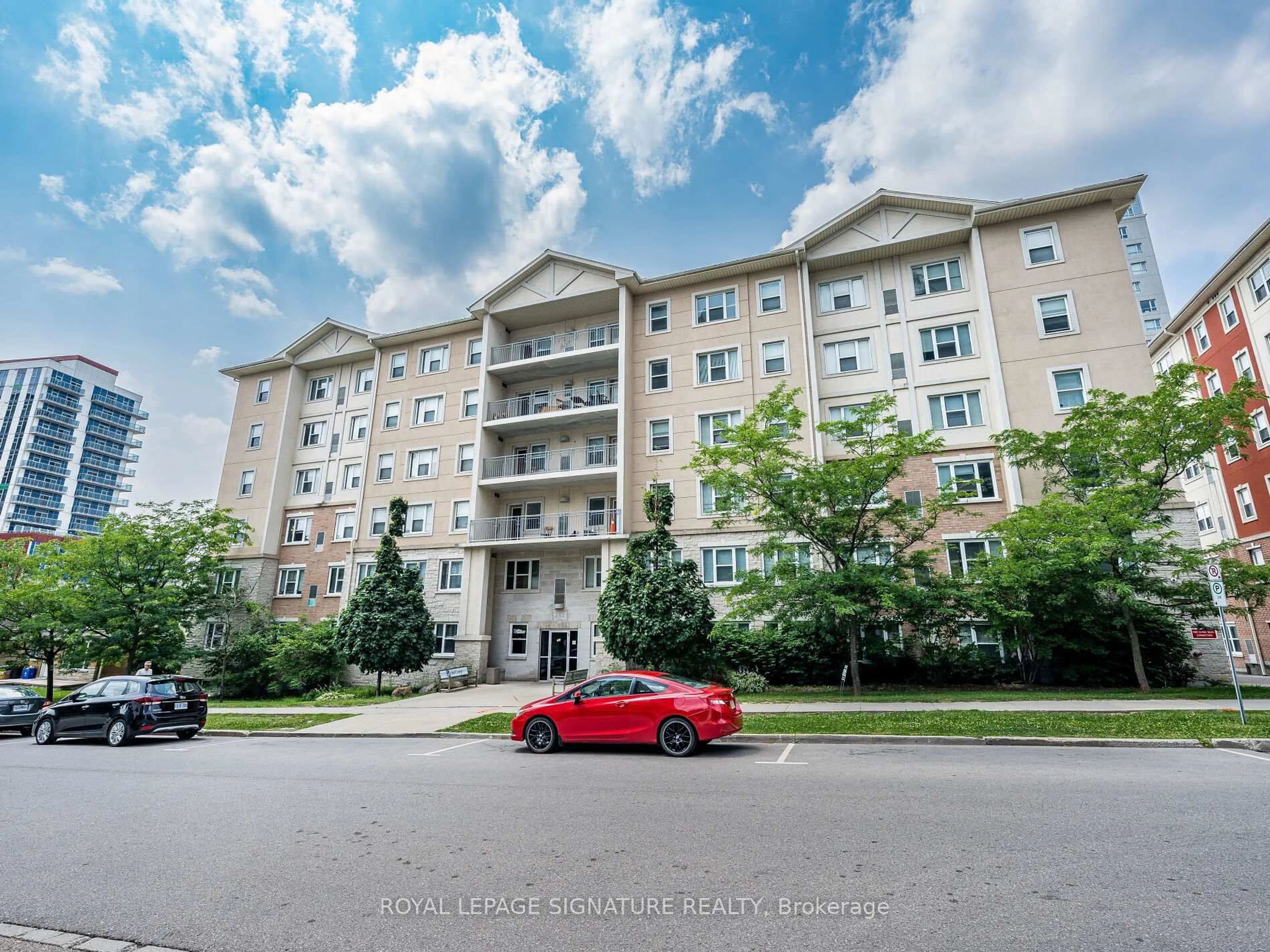 A pic from outside/outdoor area/front of a property/back of a property/a pic from drone, unknown for 251 Lester St #206, Waterloo Ontario N2L 3W6