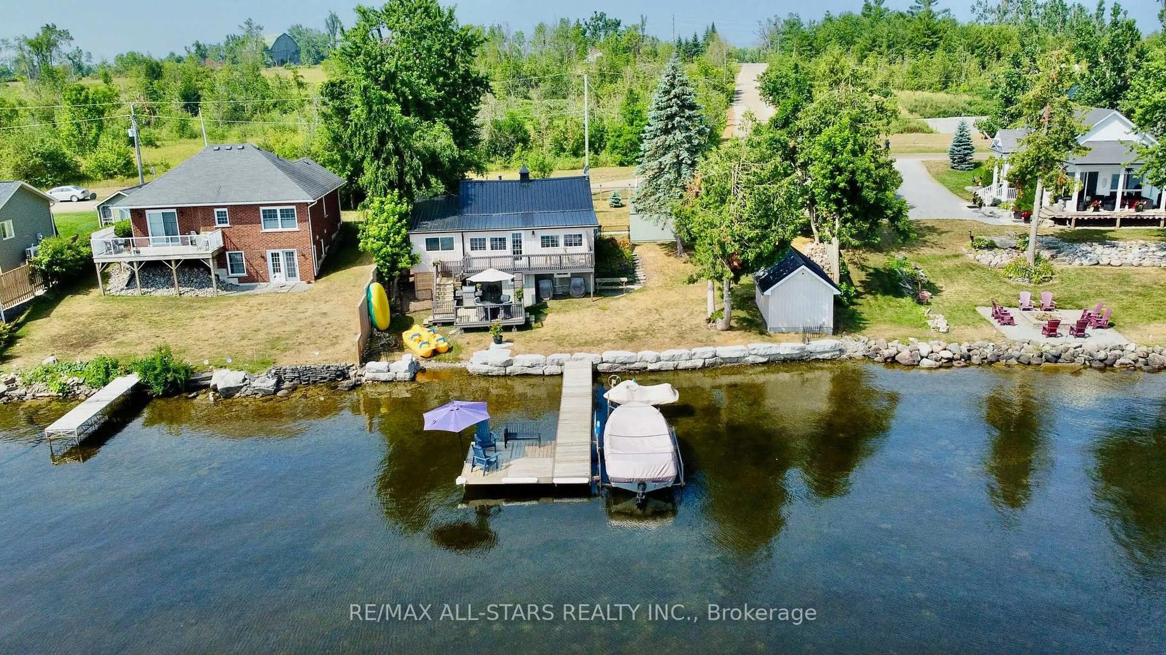 A pic from outside/outdoor area/front of a property/back of a property/a pic from drone, water/lake/river/ocean view for 25 Bayview Rd, Kawartha Lakes Ontario K0M 1N0