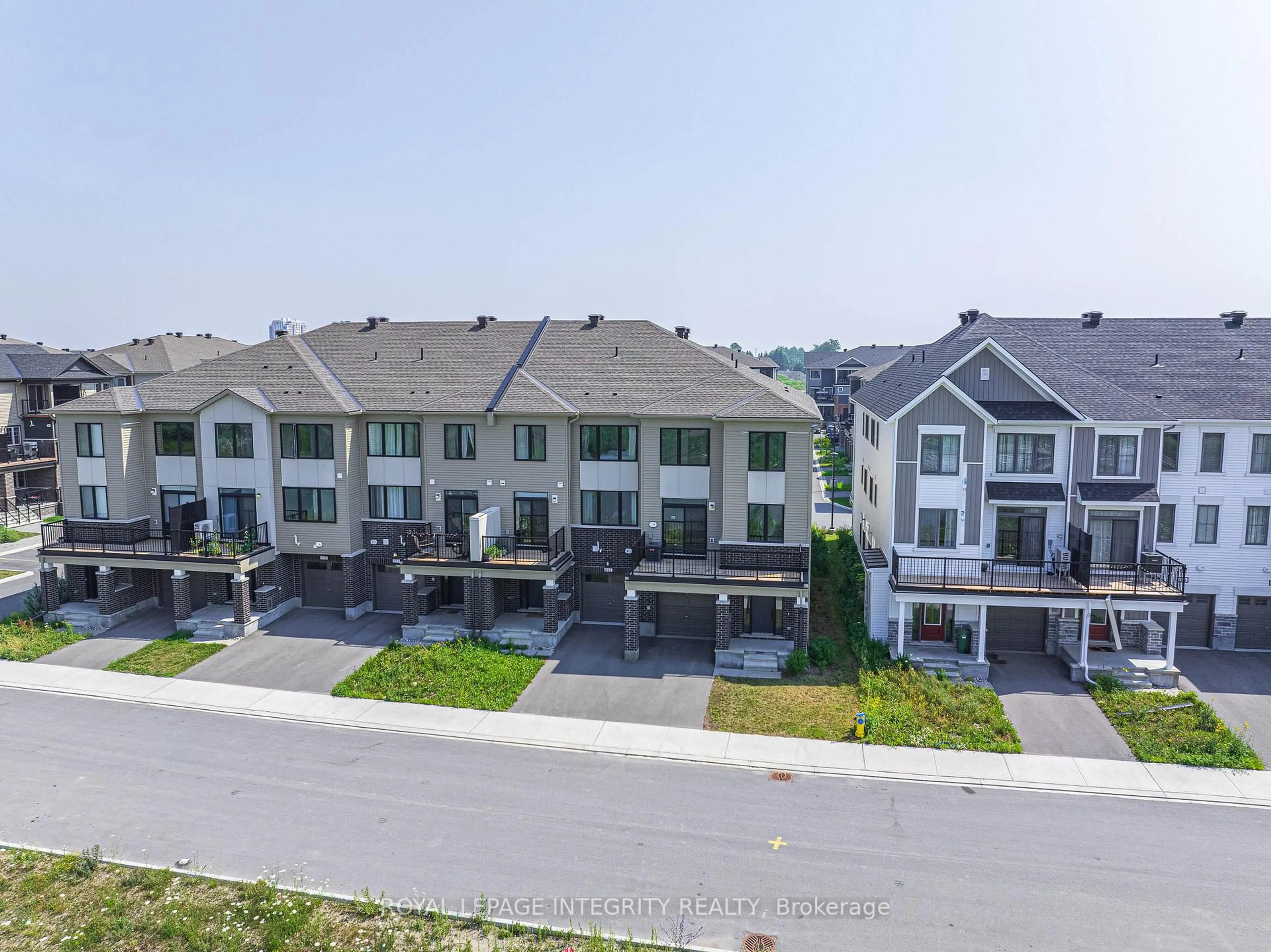A pic from outside/outdoor area/front of a property/back of a property/a pic from drone, mountain view for 610 Damson Gardens Grve, Ottawa Ontario K2J 7C8