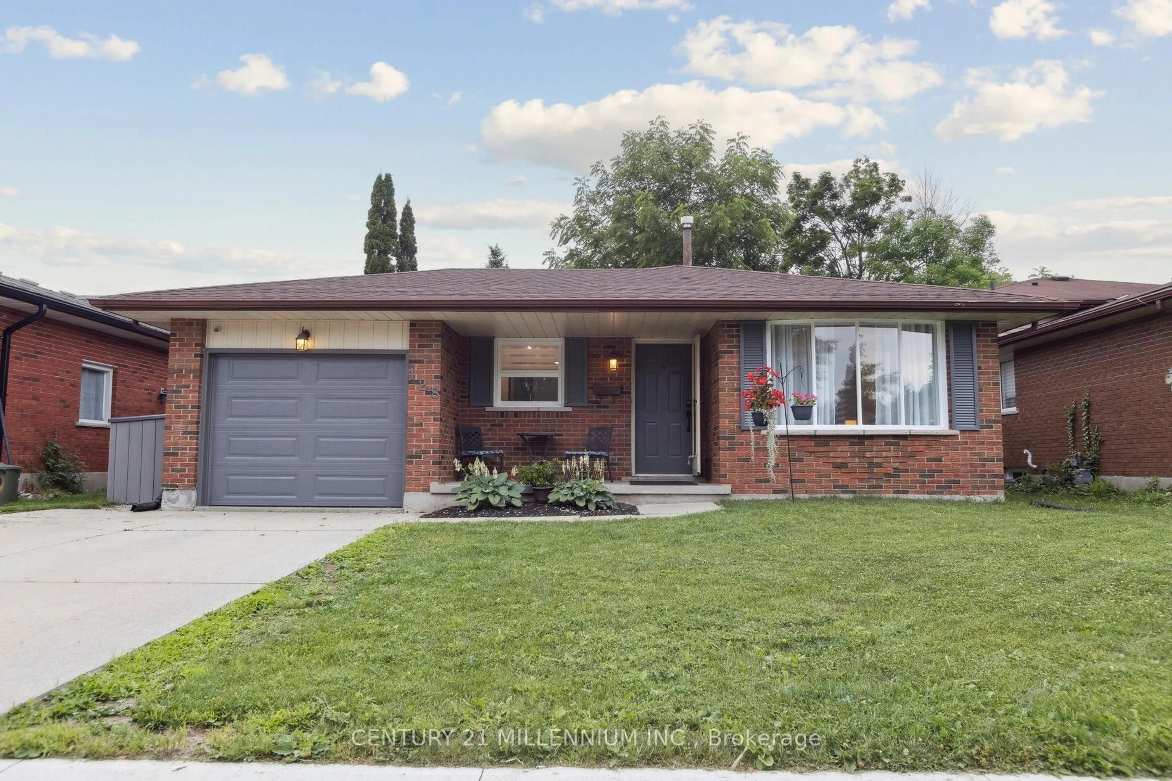 Home with brick exterior material, street for 128 Westvale Dr, Waterloo Ontario N2T 1C1