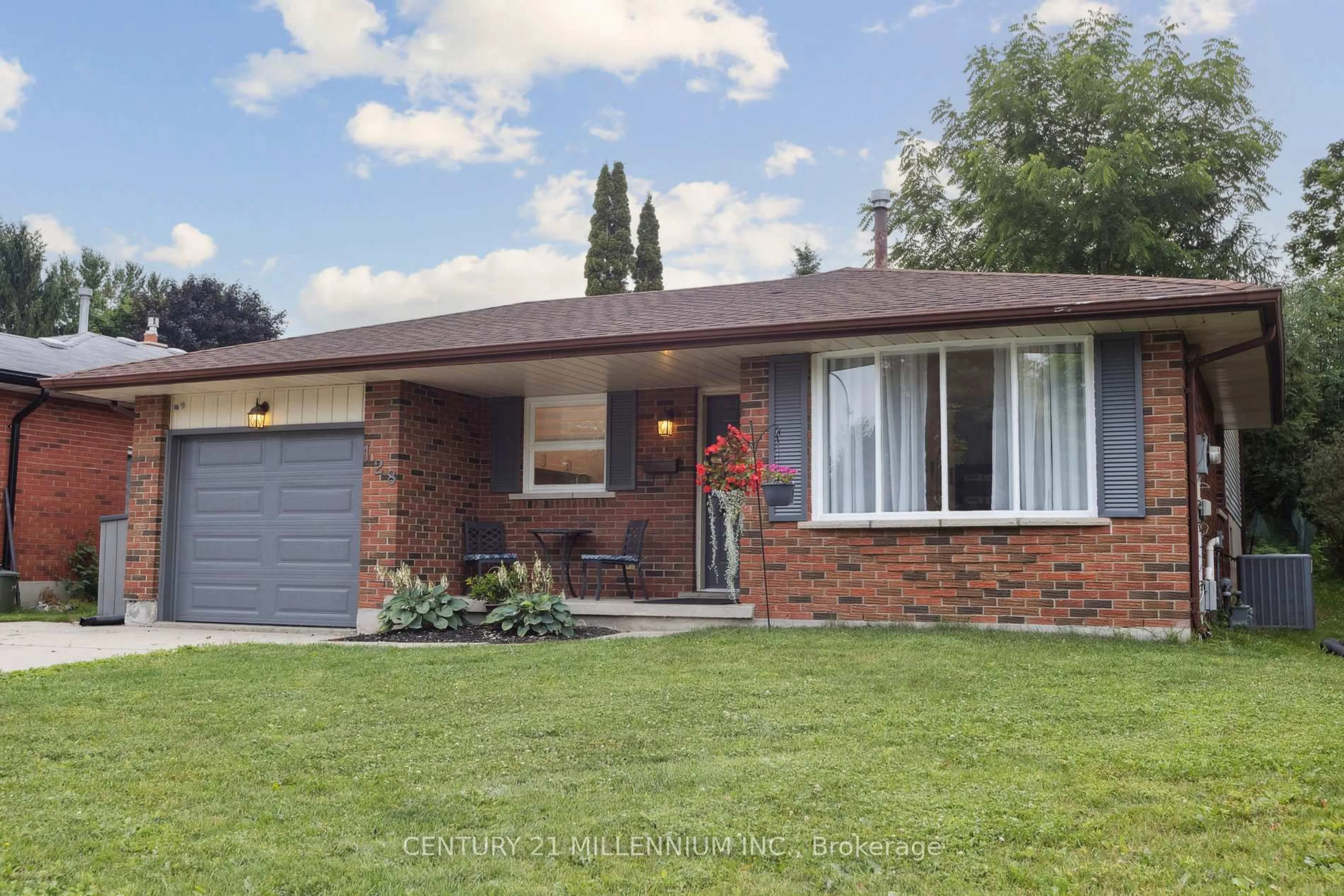 Home with brick exterior material, street for 128 Westvale Dr, Waterloo Ontario N2T 1C1