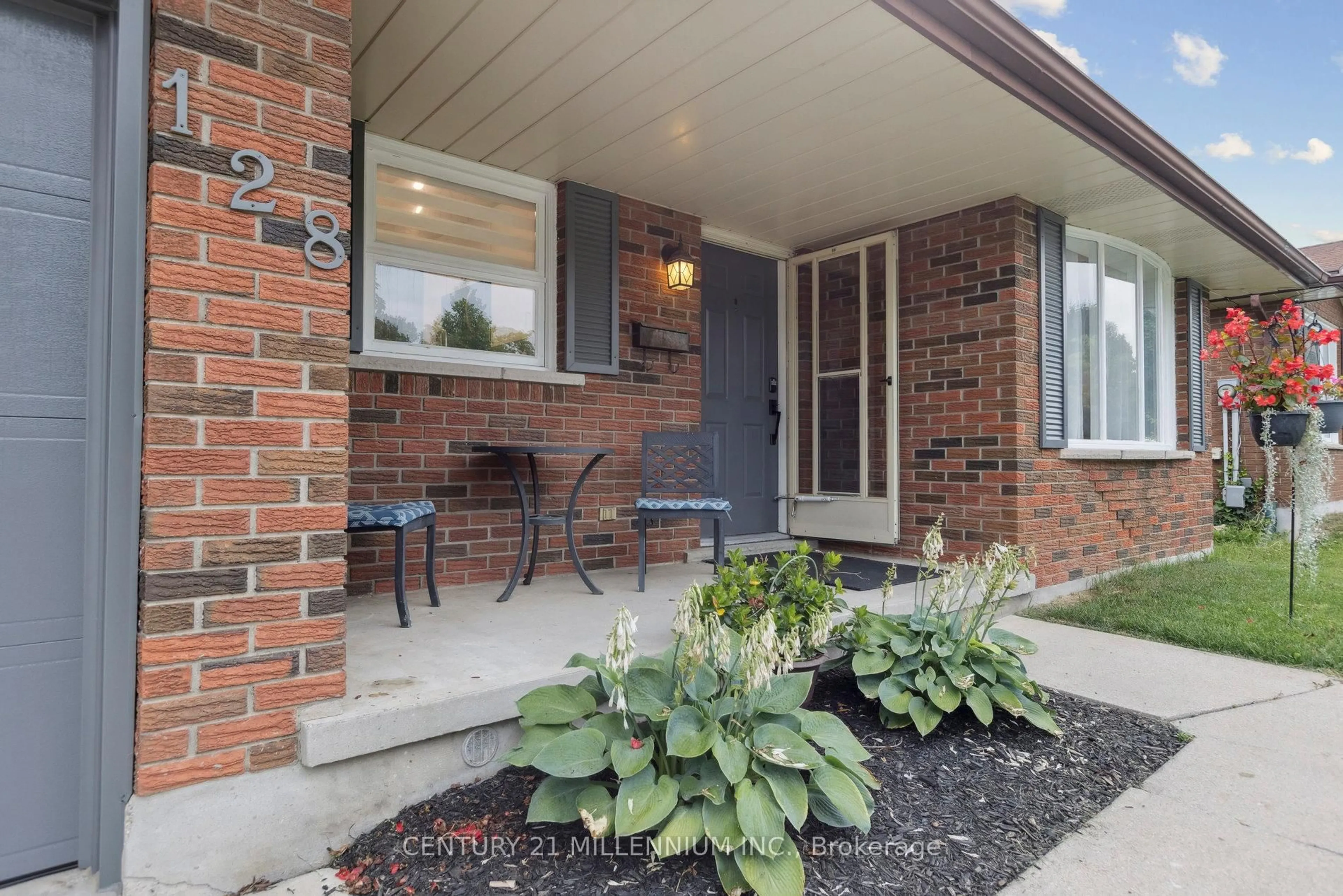 Home with brick exterior material, street for 128 Westvale Dr, Waterloo Ontario N2T 1C1