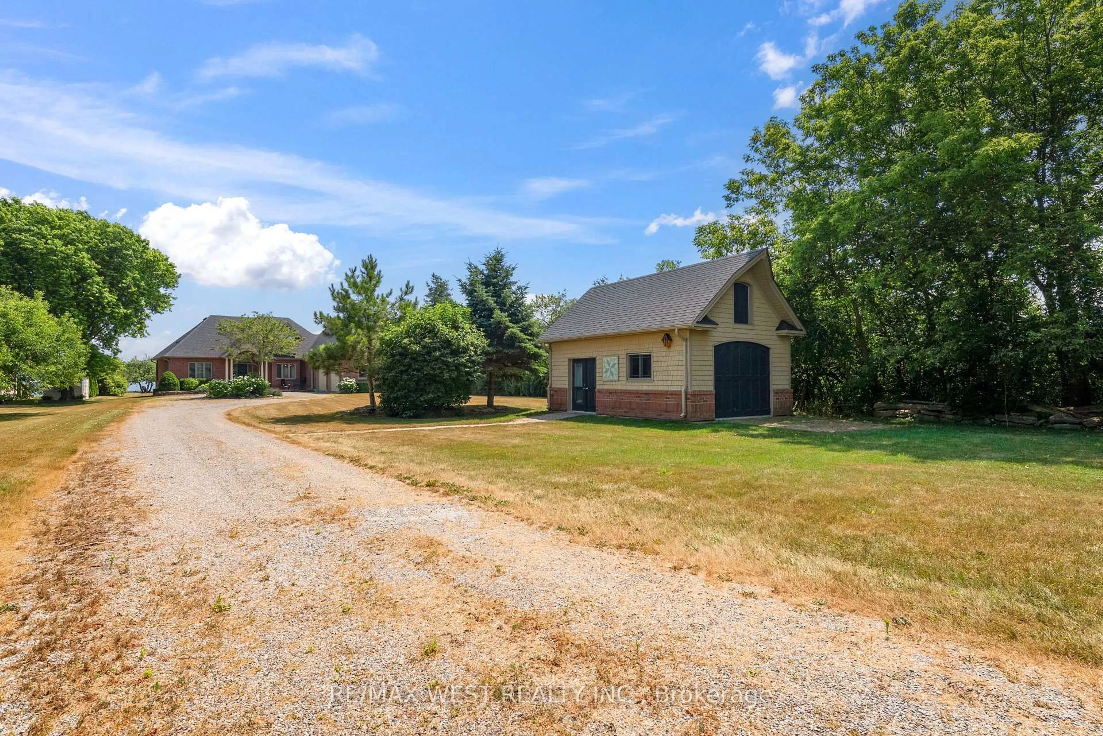 A pic from outside/outdoor area/front of a property/back of a property/a pic from drone, street for 19 Skiff Cove Road, Prince Edward County Ontario K0K 3L0