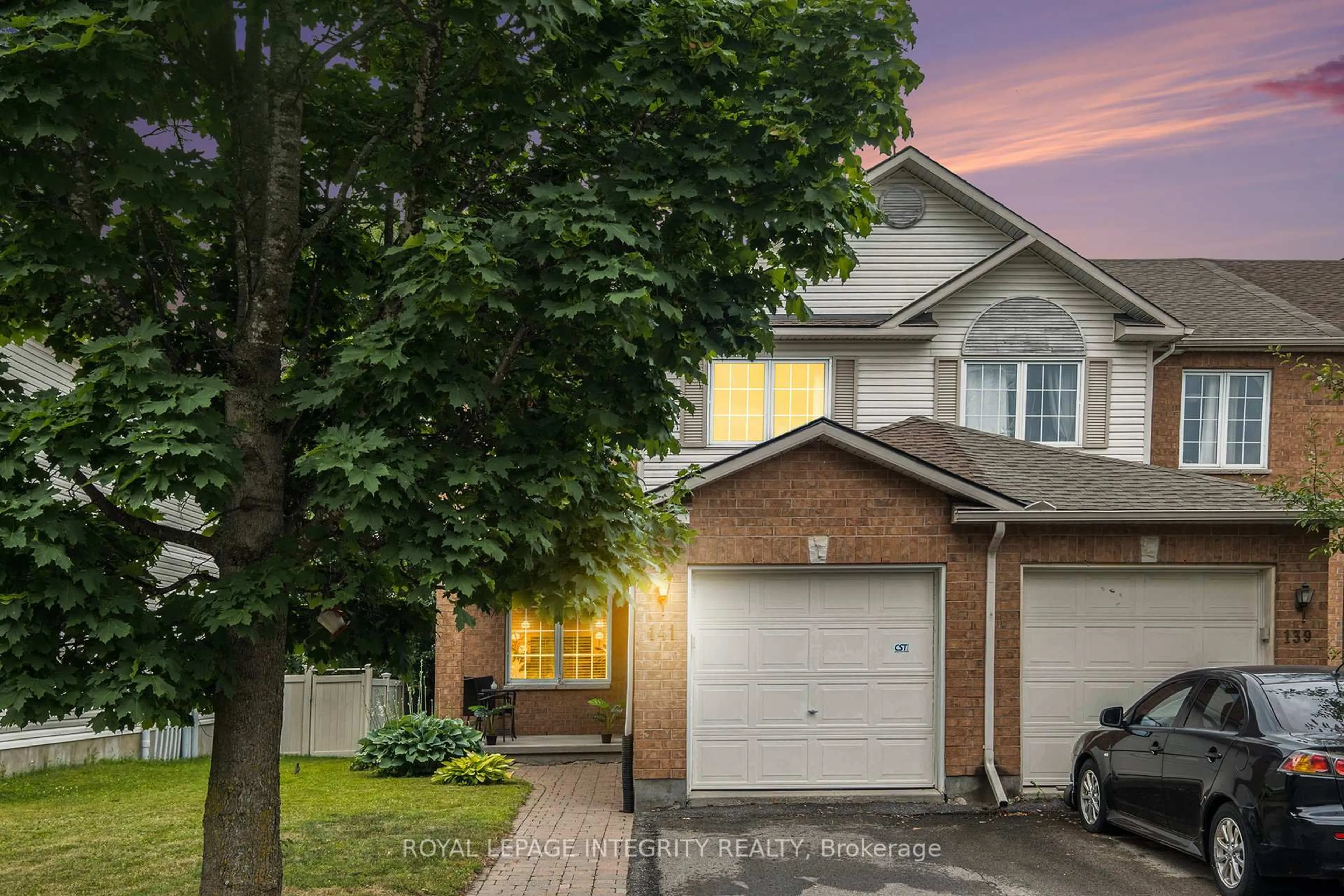 Home with brick exterior material, street for 141 Inverkip Ave, Ottawa Ontario K1T 4C3