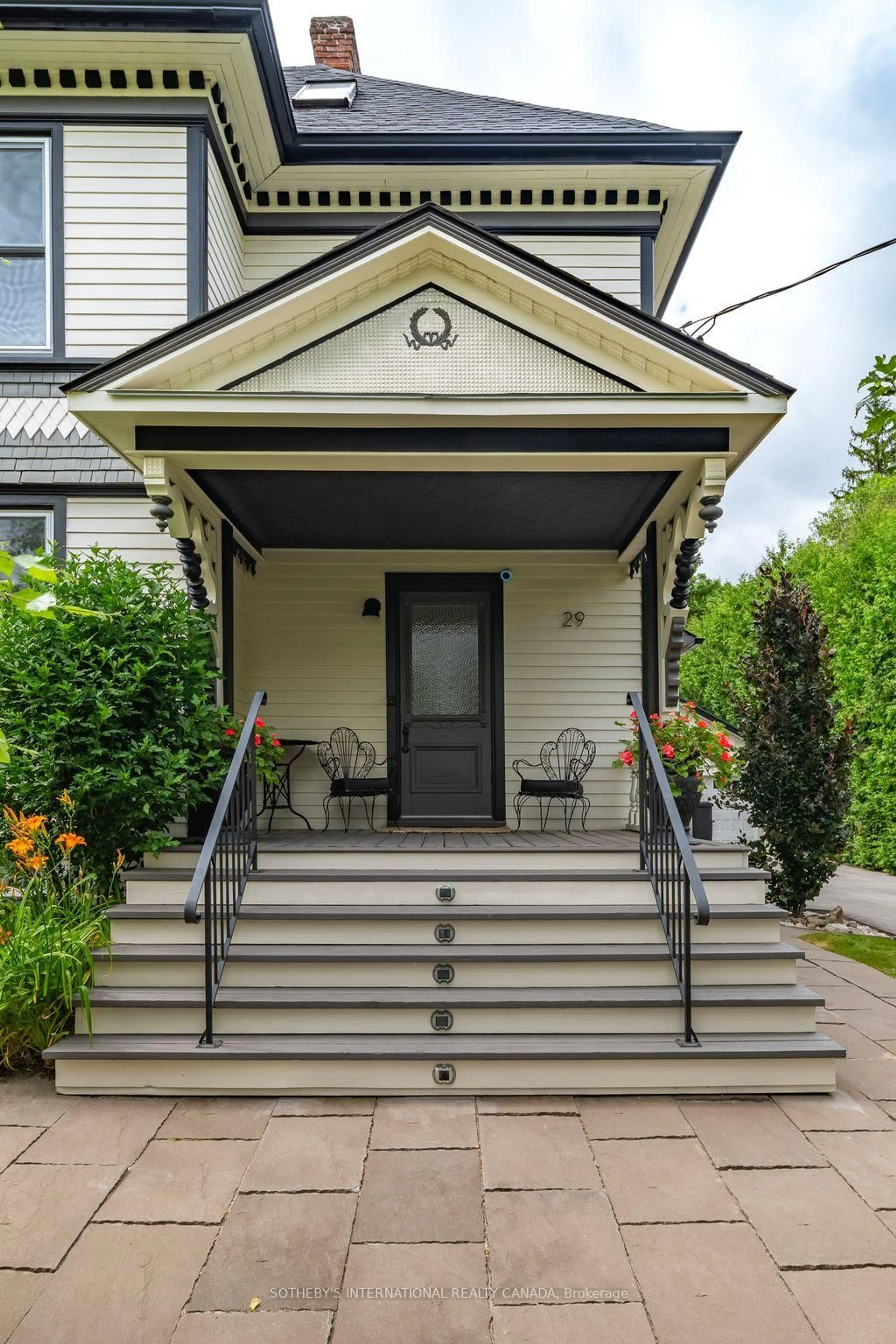Home with vinyl exterior material, street for 29 Queen St, Prince Edward County Ontario K0K 2T0