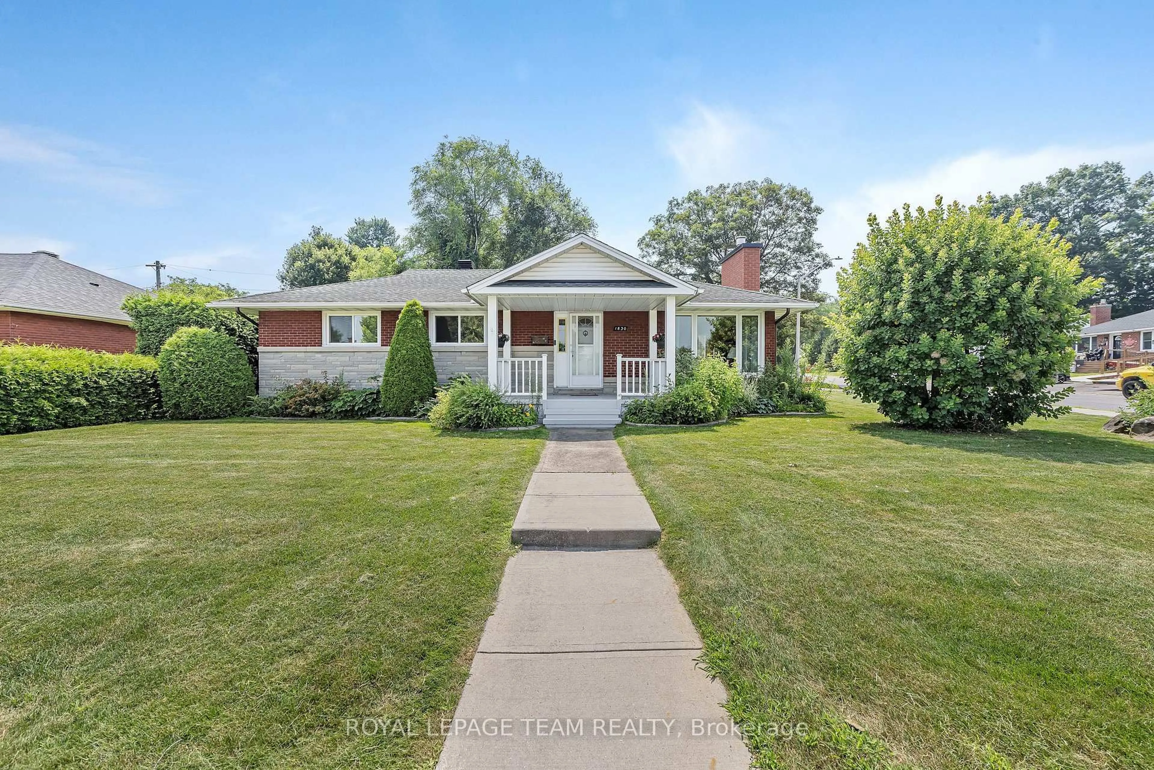 A pic from outside/outdoor area/front of a property/back of a property/a pic from drone, street for 1830 Kerr Ave, Ottawa Ontario K2A 1J3