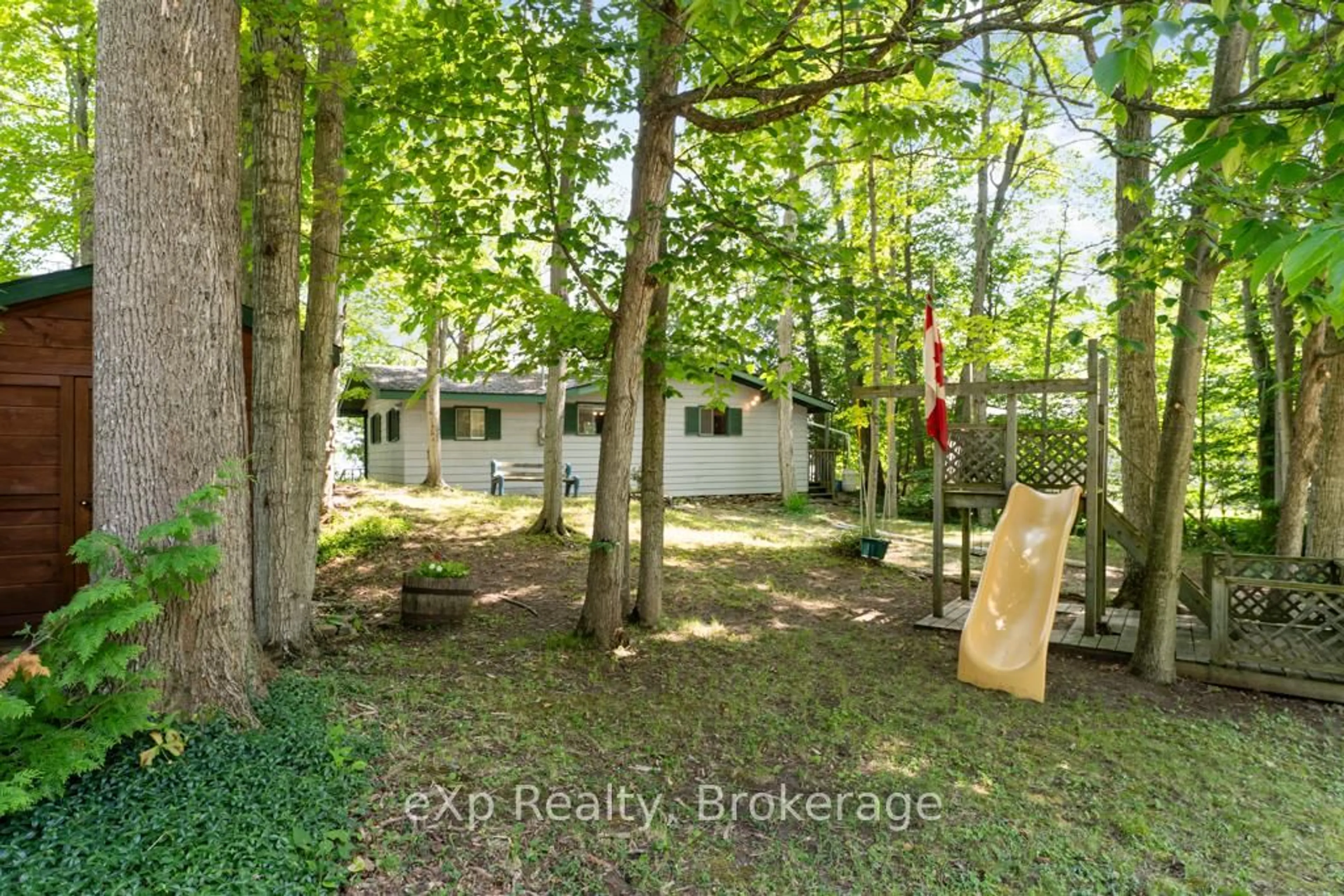 A pic from outside/outdoor area/front of a property/back of a property/a pic from drone, forest/trees view for 670 Mallory Beach Rd, South Bruce Peninsula Ontario N0H 2T0