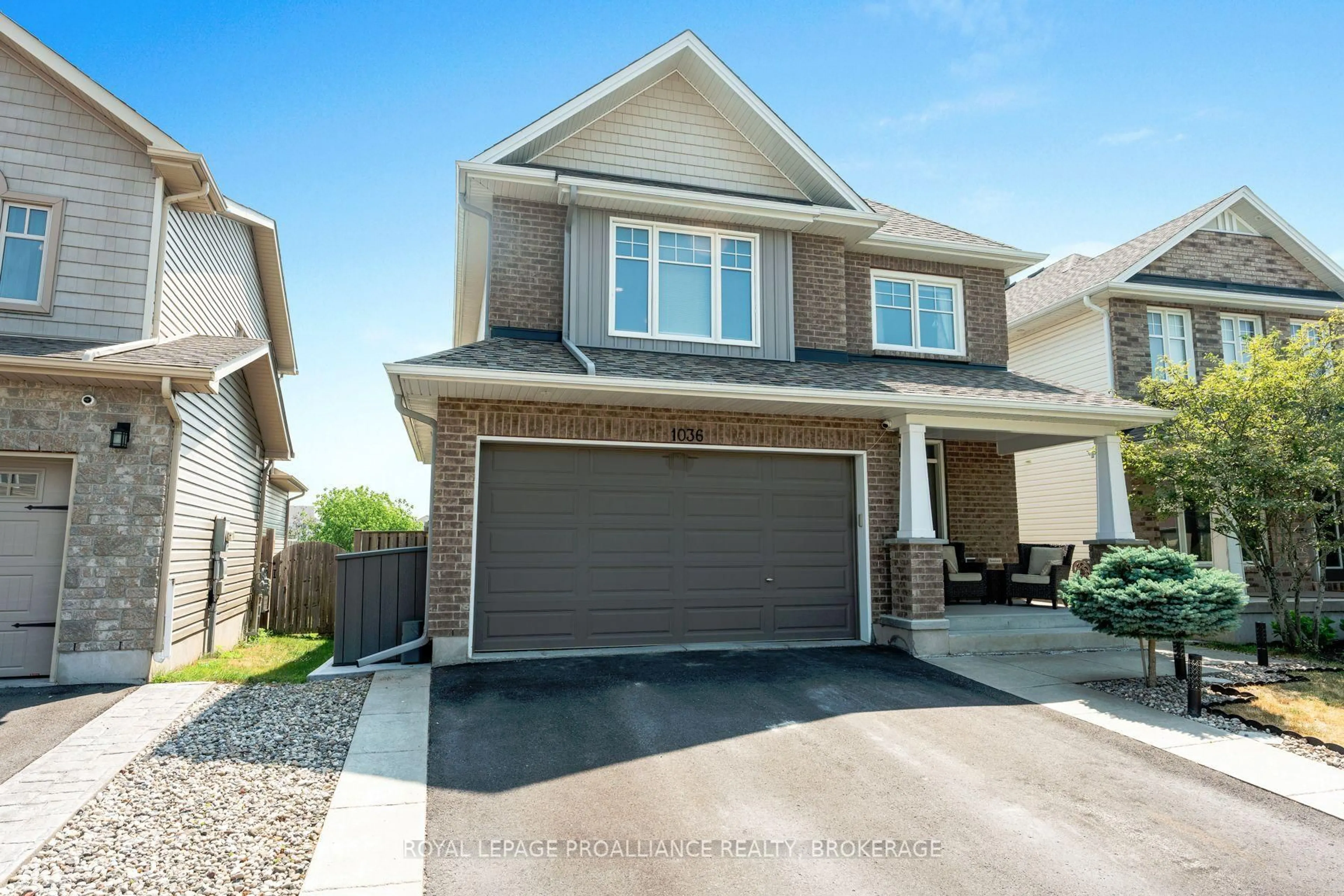 Home with vinyl exterior material, street for 1036 Woodhaven Dr, Kingston Ontario K7P 0H7