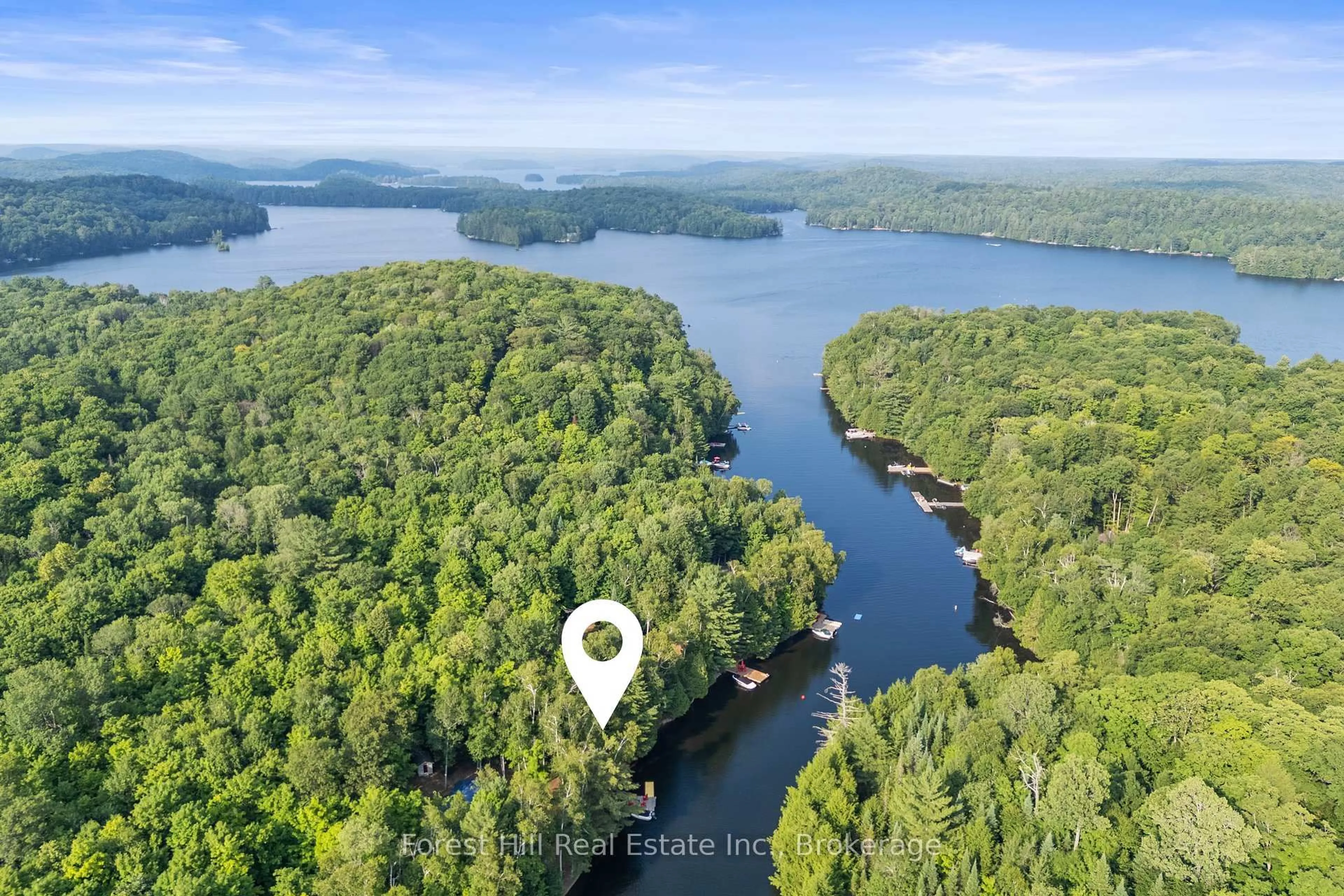 A pic from outside/outdoor area/front of a property/back of a property/a pic from drone, water/lake/river/ocean view for 1008 Summit Dr, Algonquin Highlands Ontario P0A 1E0