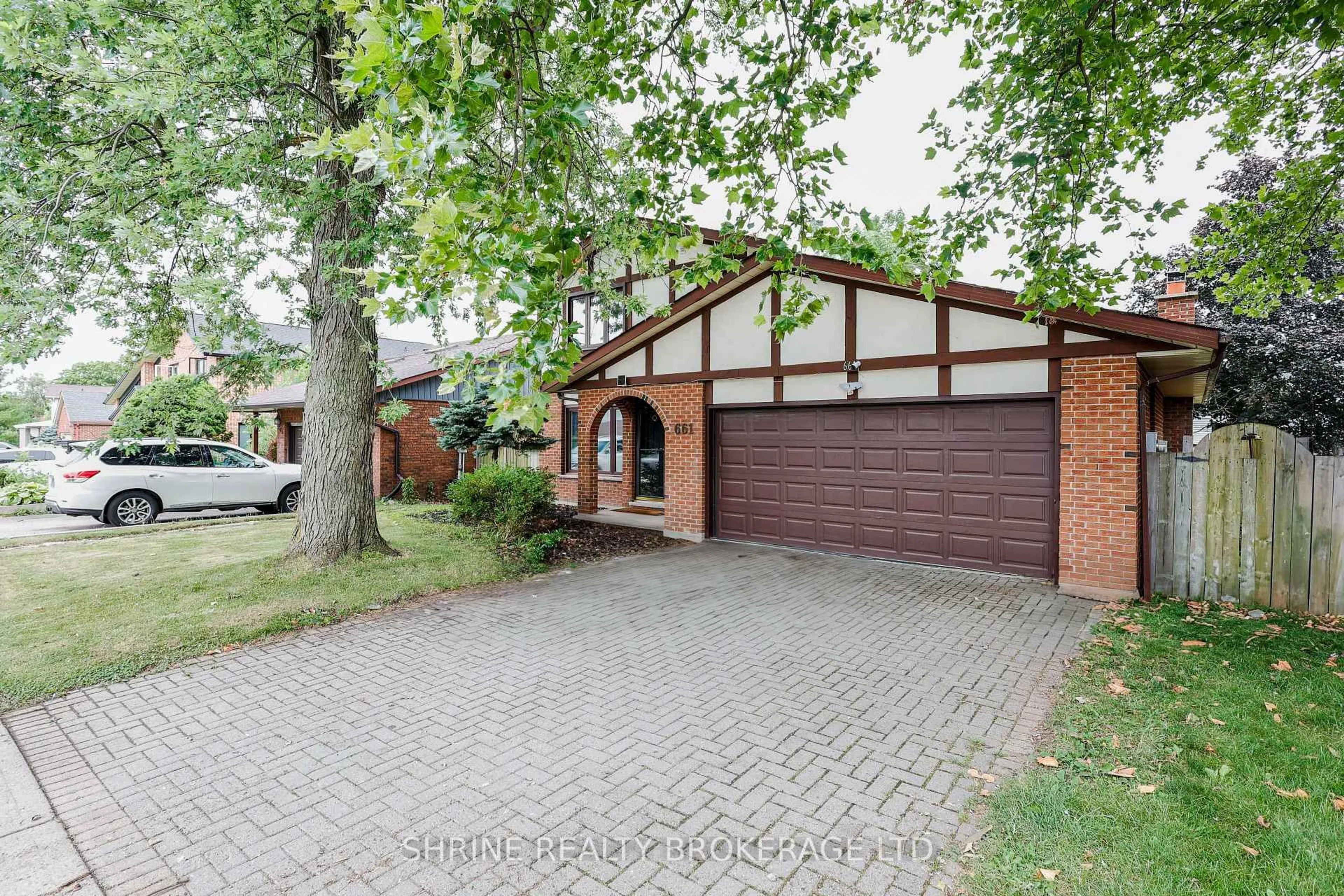 Home with brick exterior material, street for 661 UPPER QUEEN St, London South Ontario N6J 4Y6