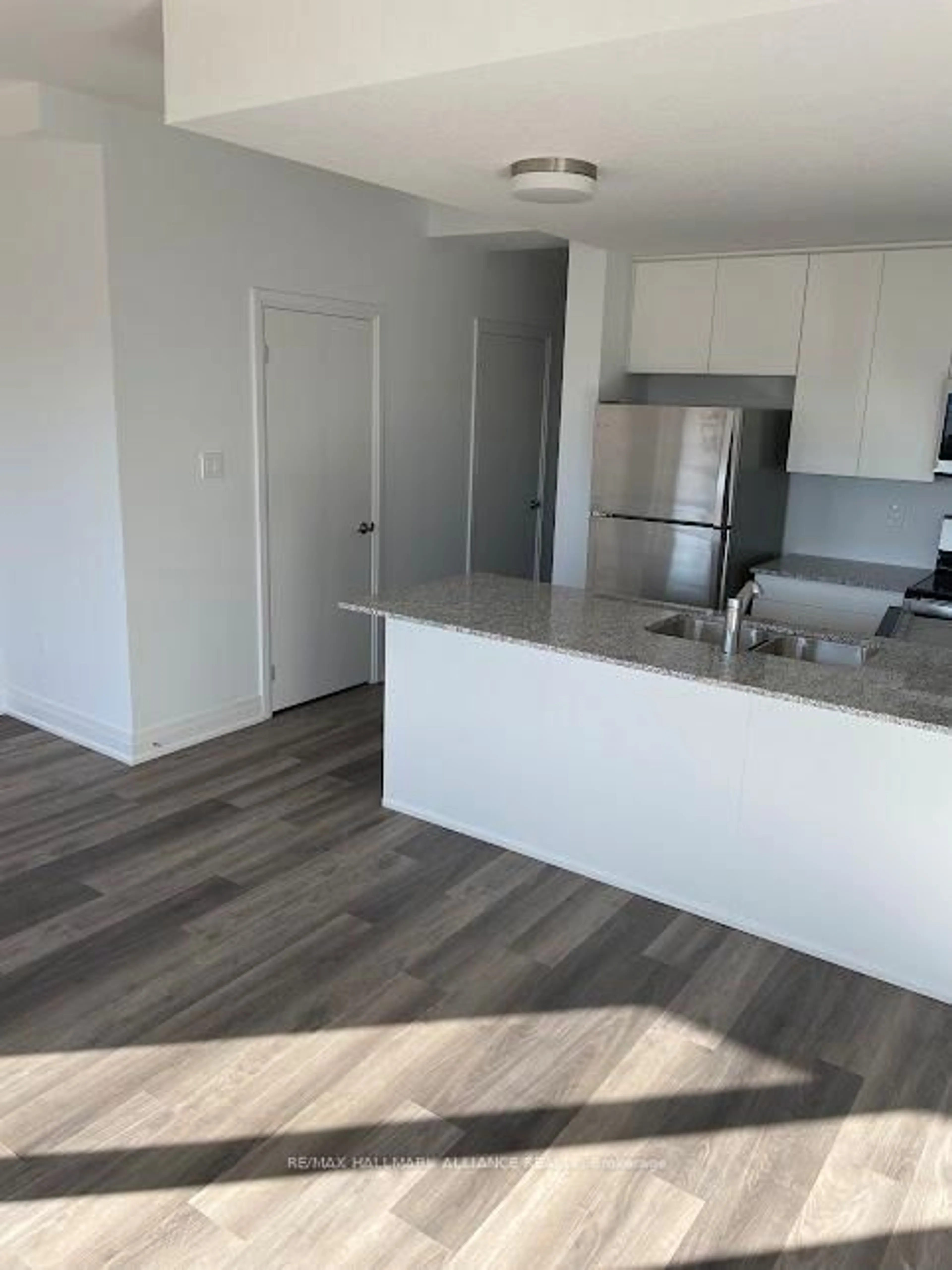 Open concept kitchen, wood/laminate floor for 30 Steele Cres #38, Guelph Ontario N1E 0S7