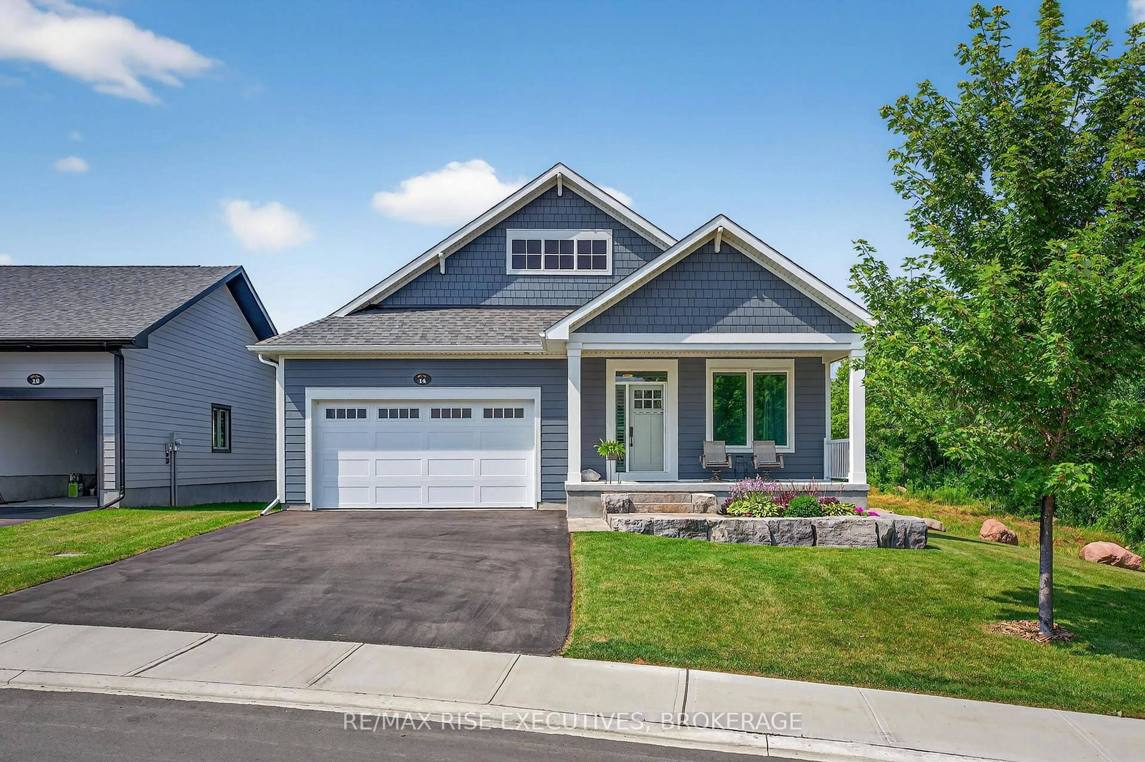 Home with vinyl exterior material, street for 14 Newhaven Gate, Westport Ontario K0G 1X0