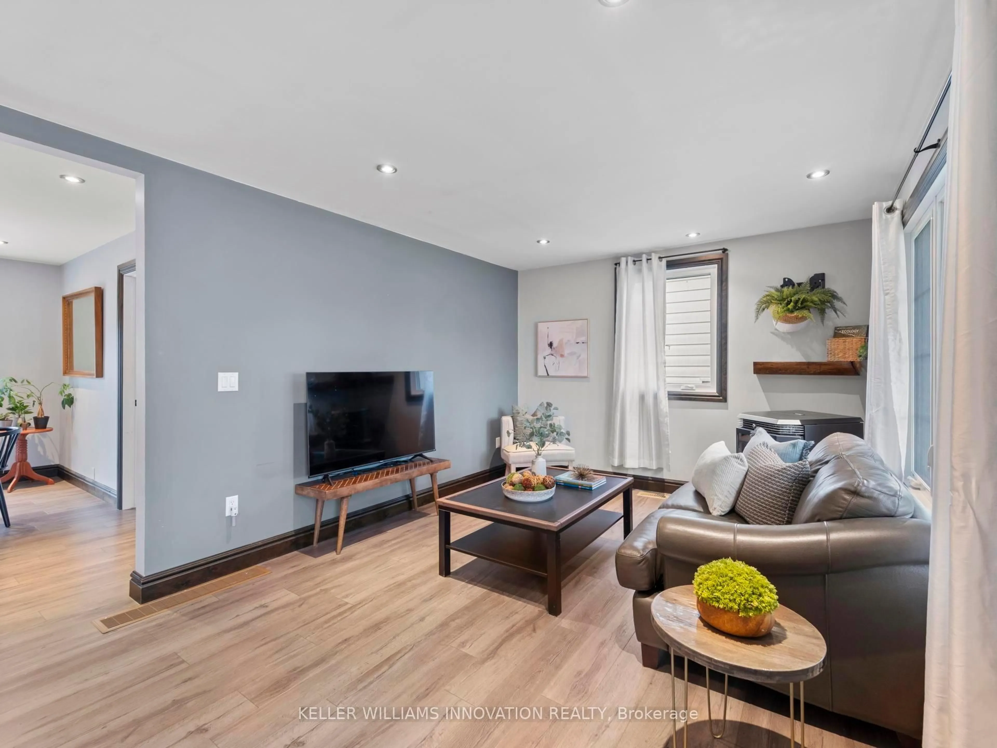 Living room with furniture, wood/laminate floor for 6992 Raglan St, West Perth Ontario N0K 1E0