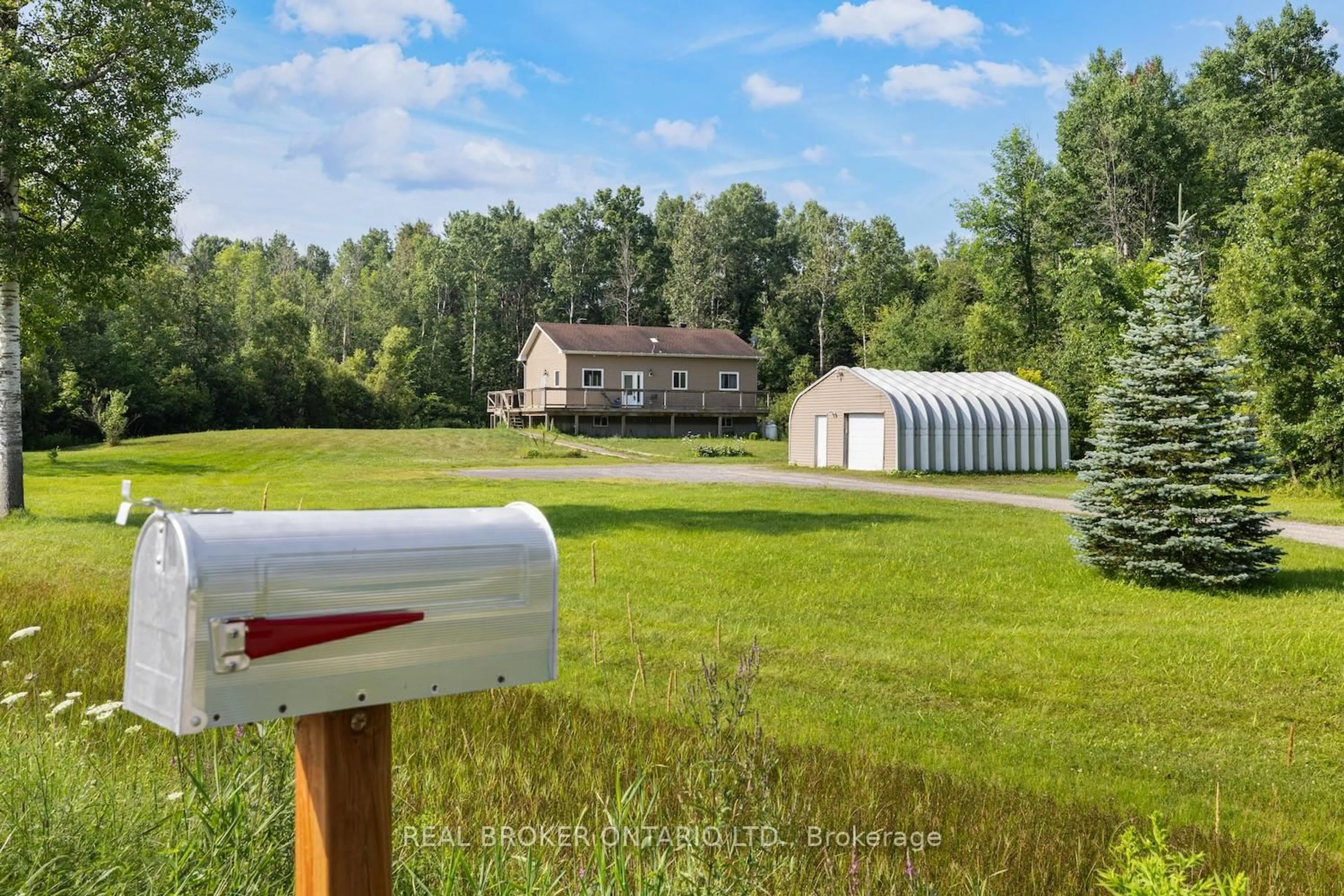 A pic from outside/outdoor area/front of a property/back of a property/a pic from drone, unknown for 323 County Road 18 Rd, North Grenville Ontario K0G 1T0