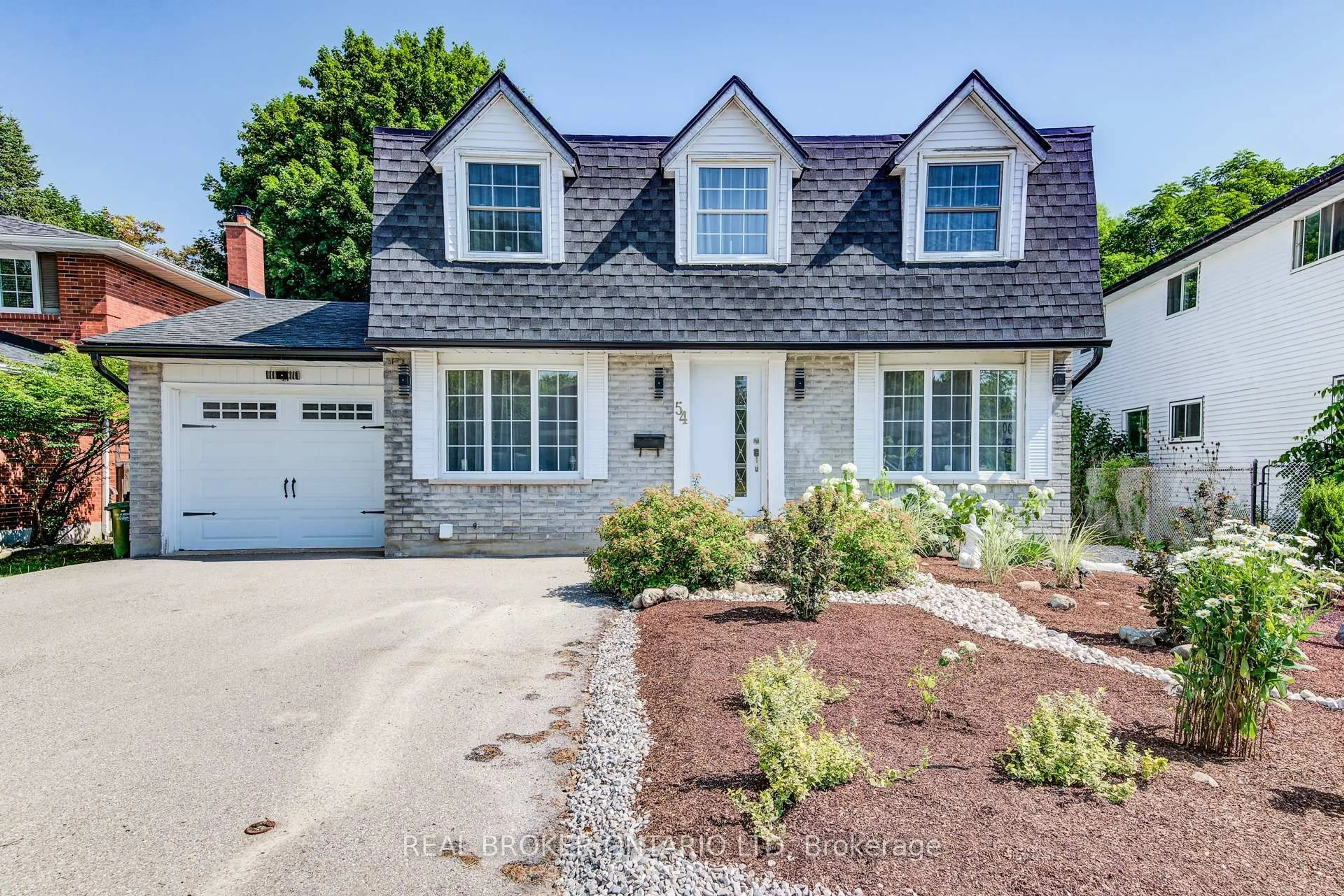 Home with brick exterior material, street for 54 Yewholme Dr, Guelph Ontario N1G 3A4
