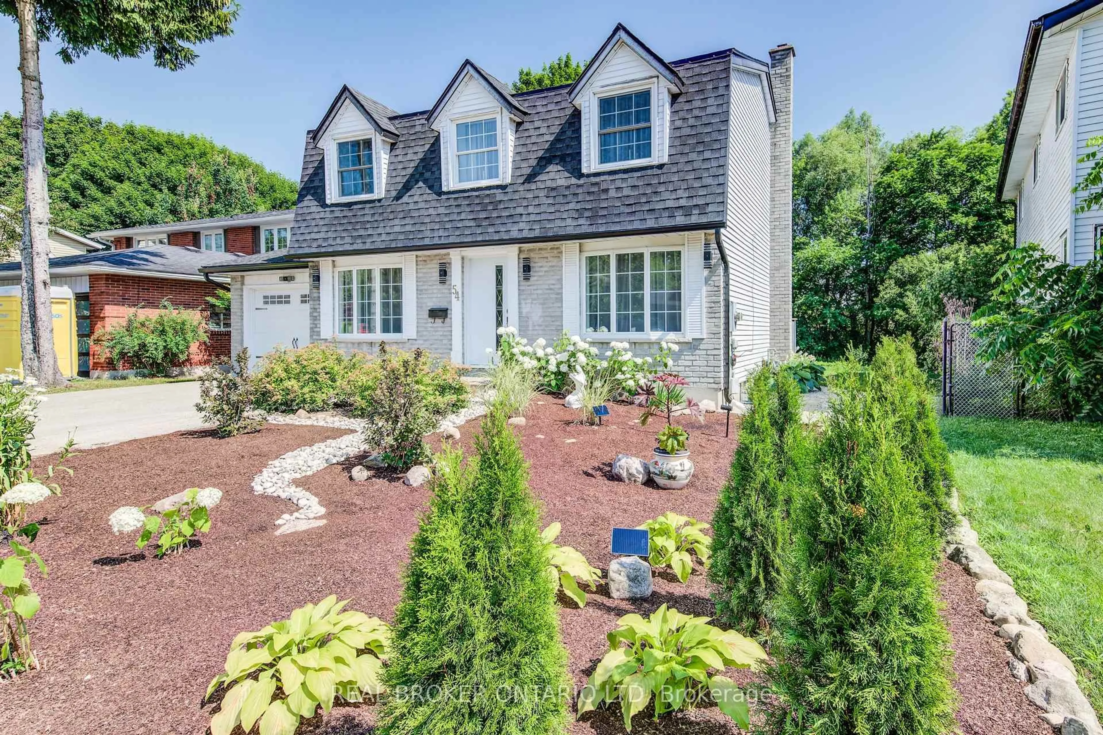 Home with brick exterior material, street for 54 Yewholme Dr, Guelph Ontario N1G 3A4